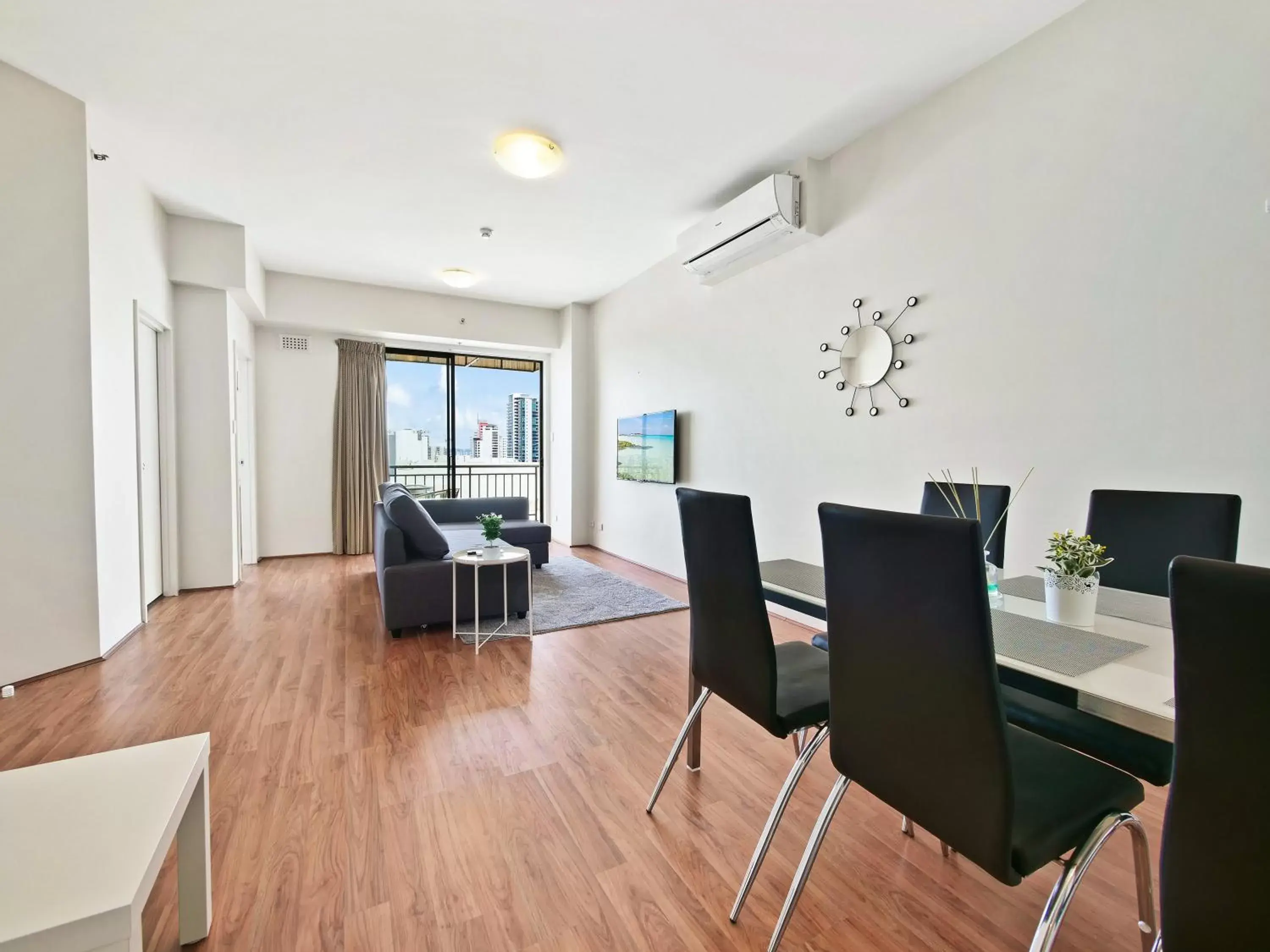 Living room, Dining Area in All Suites Perth