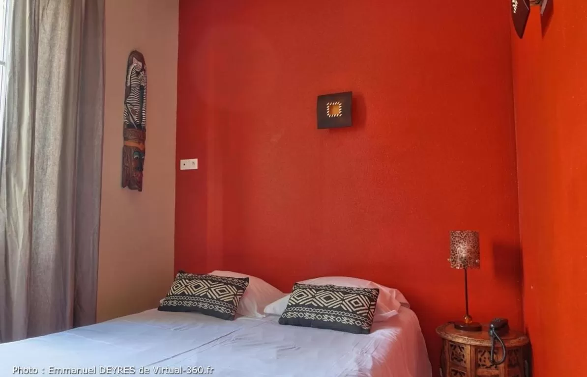 Bed in Hôtel de Bretagne - anciennement Queen Serenity Hotel