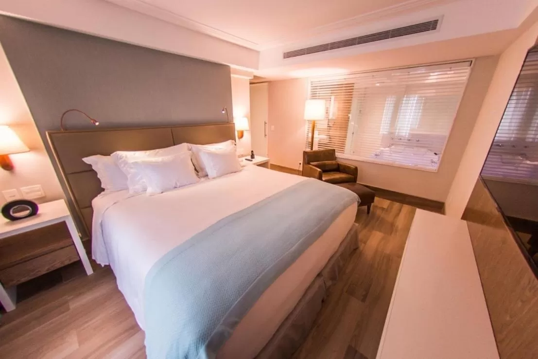 Bed in Vogal Luxury Beach Hotel & SPA