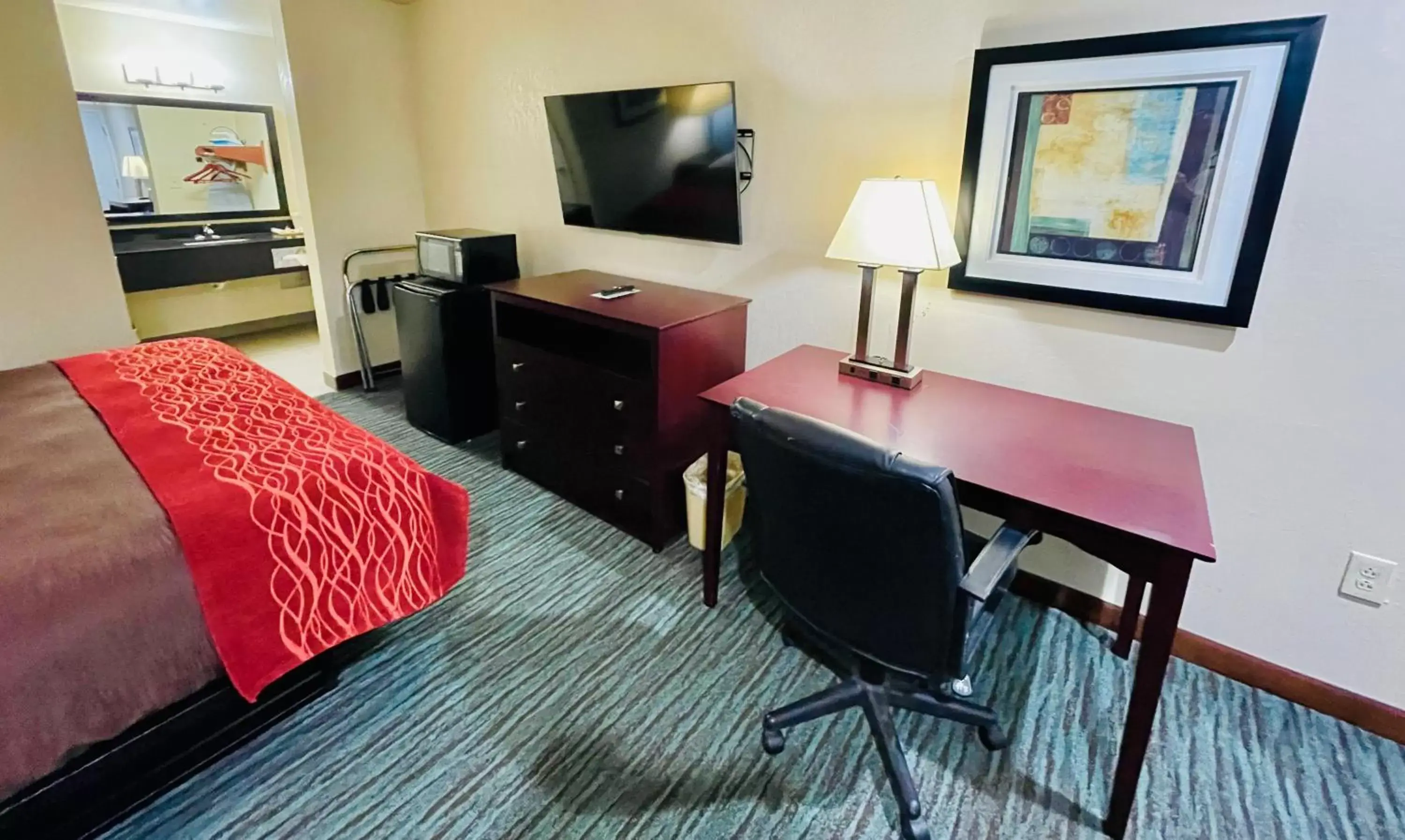 TV and multimedia, TV/Entertainment Center in Garden Inn and Suites