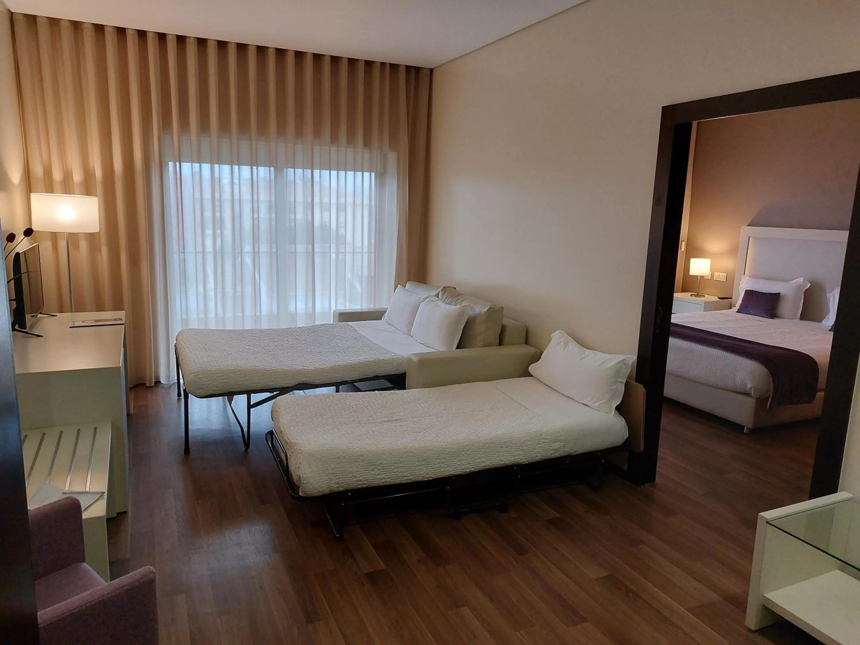 Living room, Bed in Hotel Monte Lírio