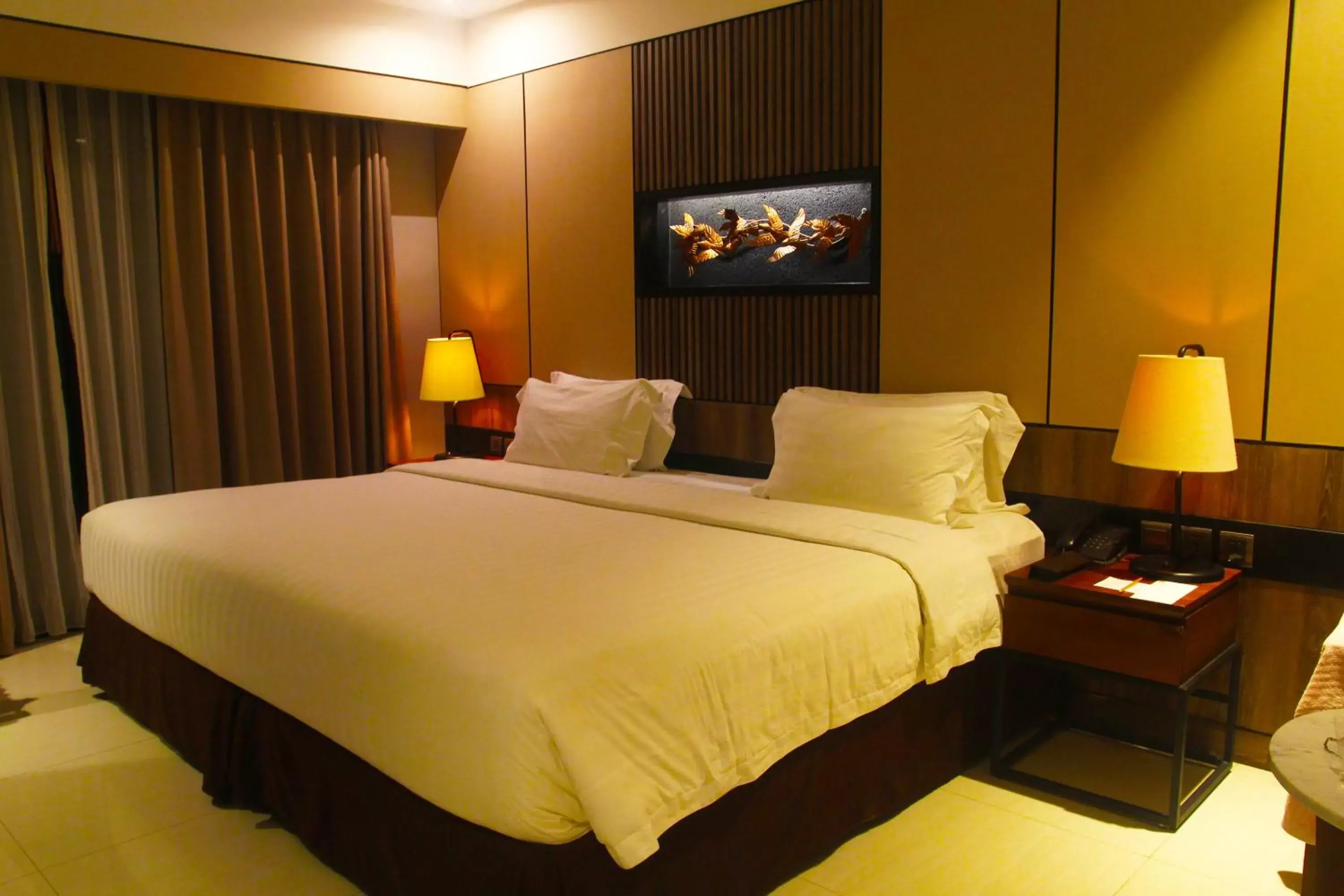 Bed in The Nest Hotel Nusa Dua