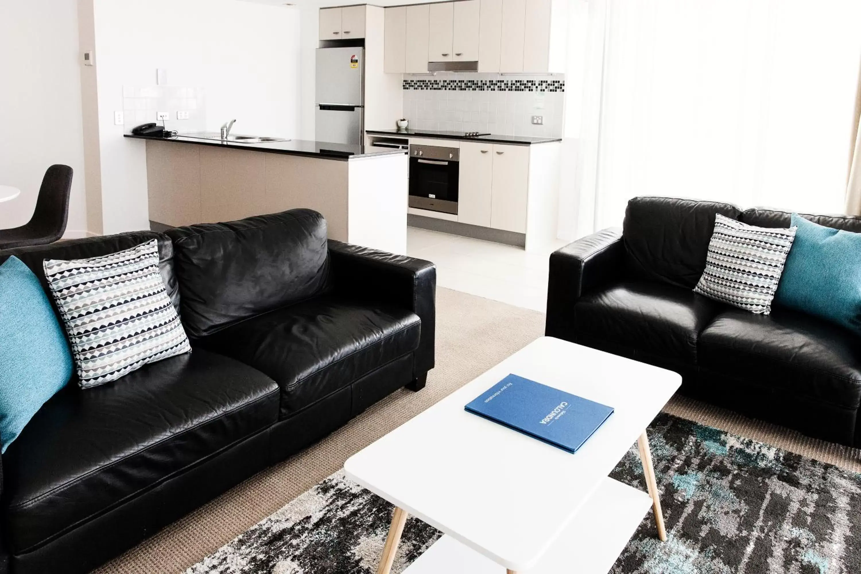 Kitchen or kitchenette, Seating Area in Ocean Views Resort Caloundra