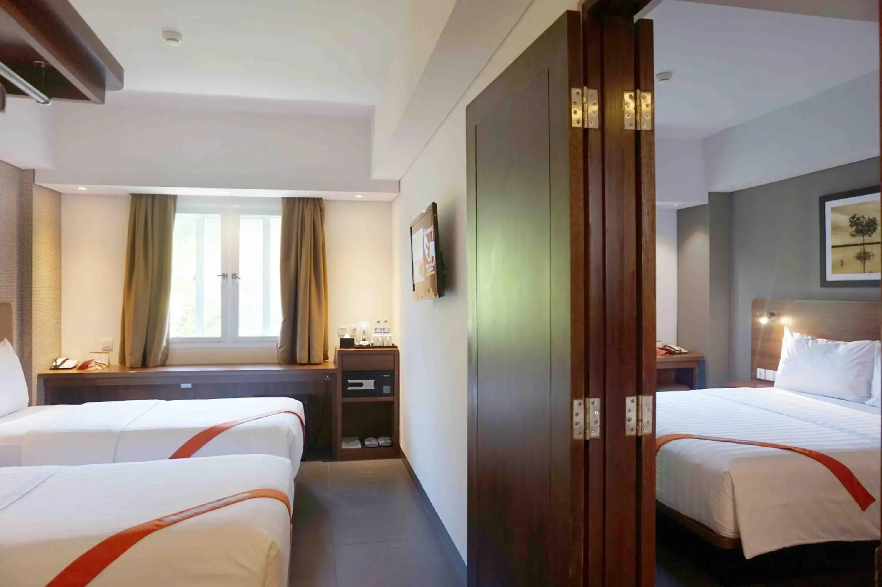 Bed in J4 Hotels Legian