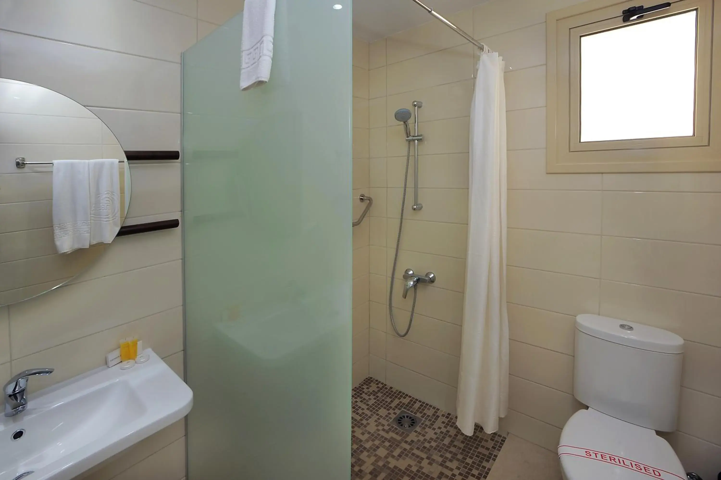 Bathroom in Nelia Beach Hotel & Spa