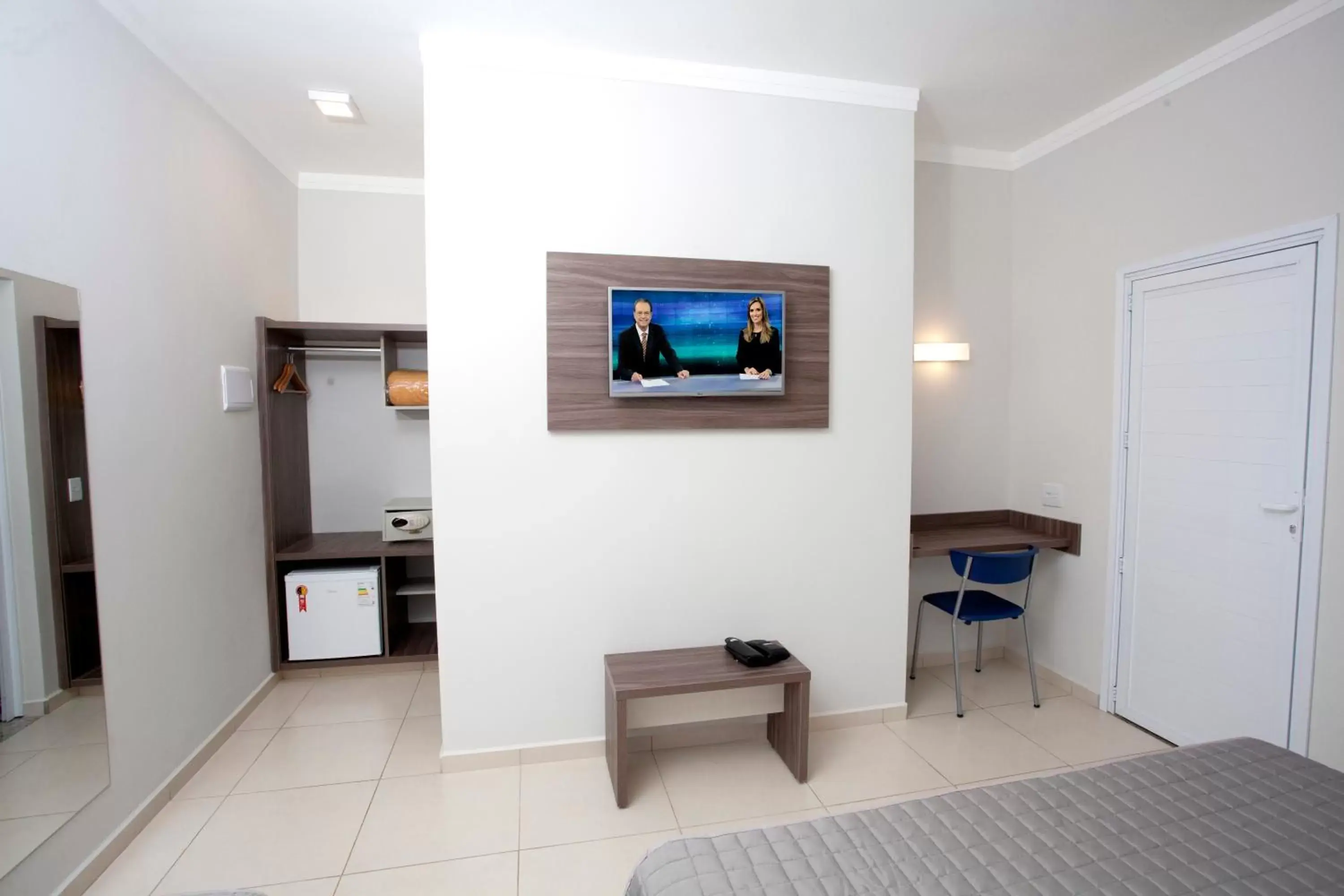 Photo of the whole room, TV/Entertainment Center in Portal Hotel Mogi Mirim