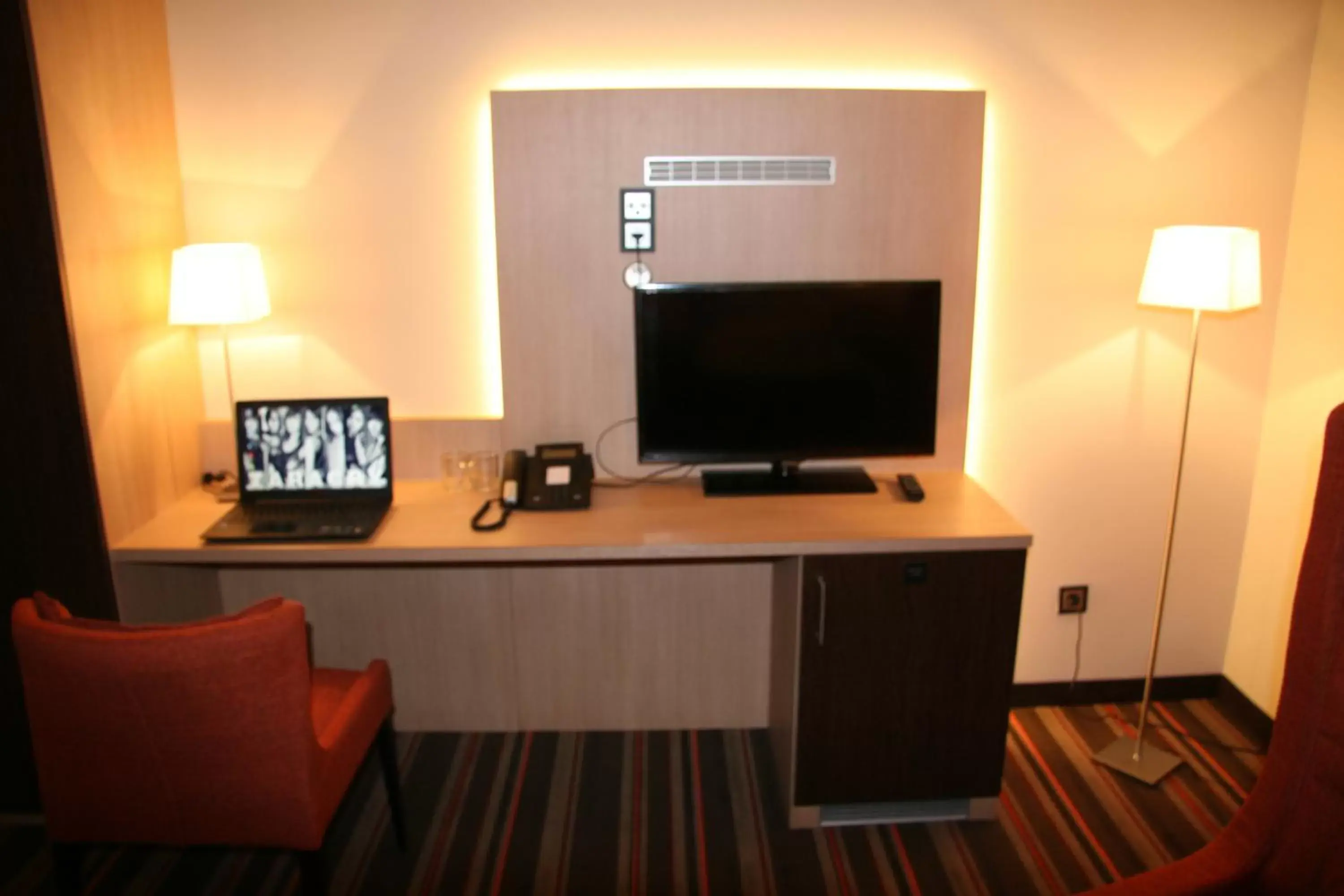 TV and multimedia, TV/Entertainment Center in Hotel Fortune