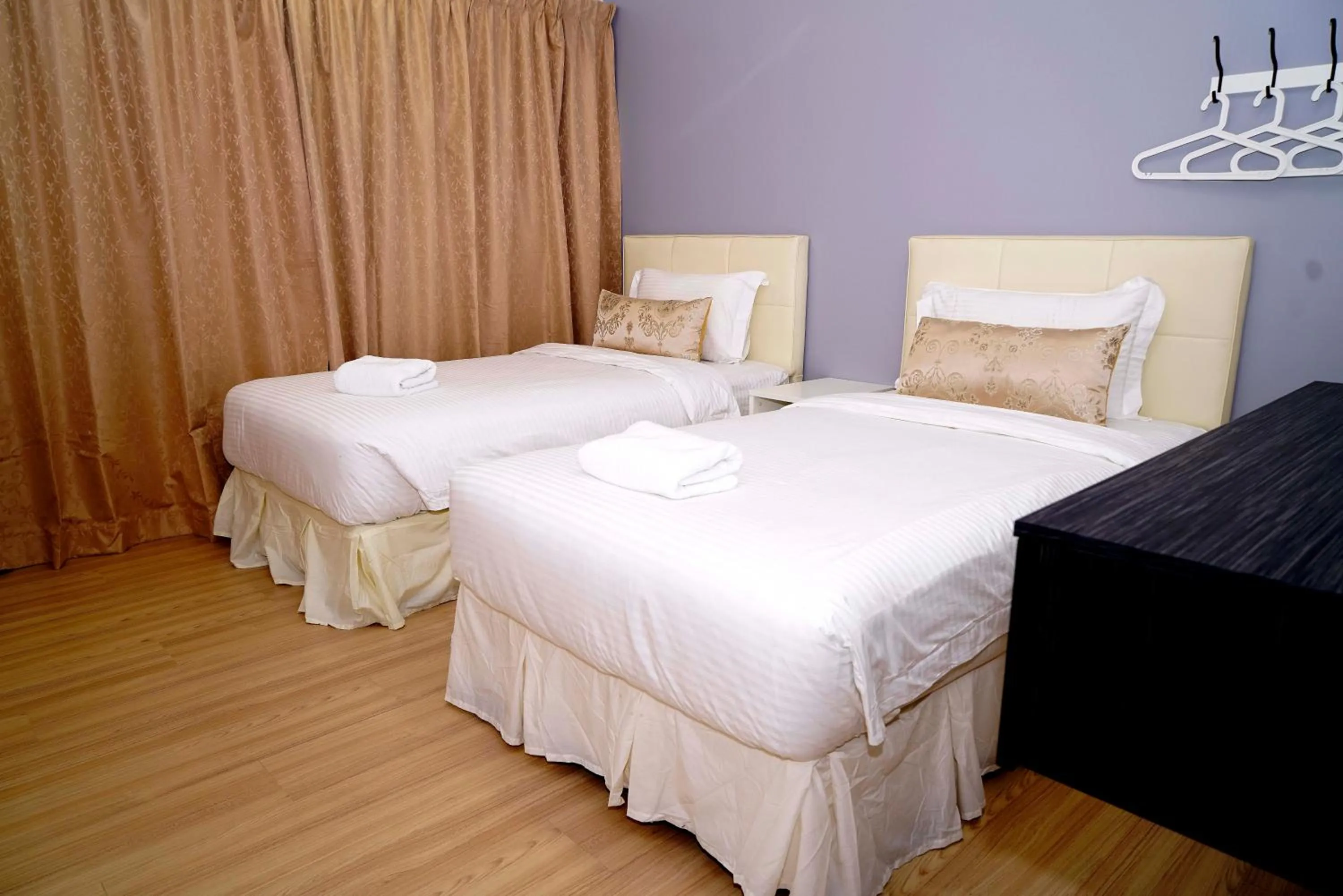 Bed in Alami Garden Hotel