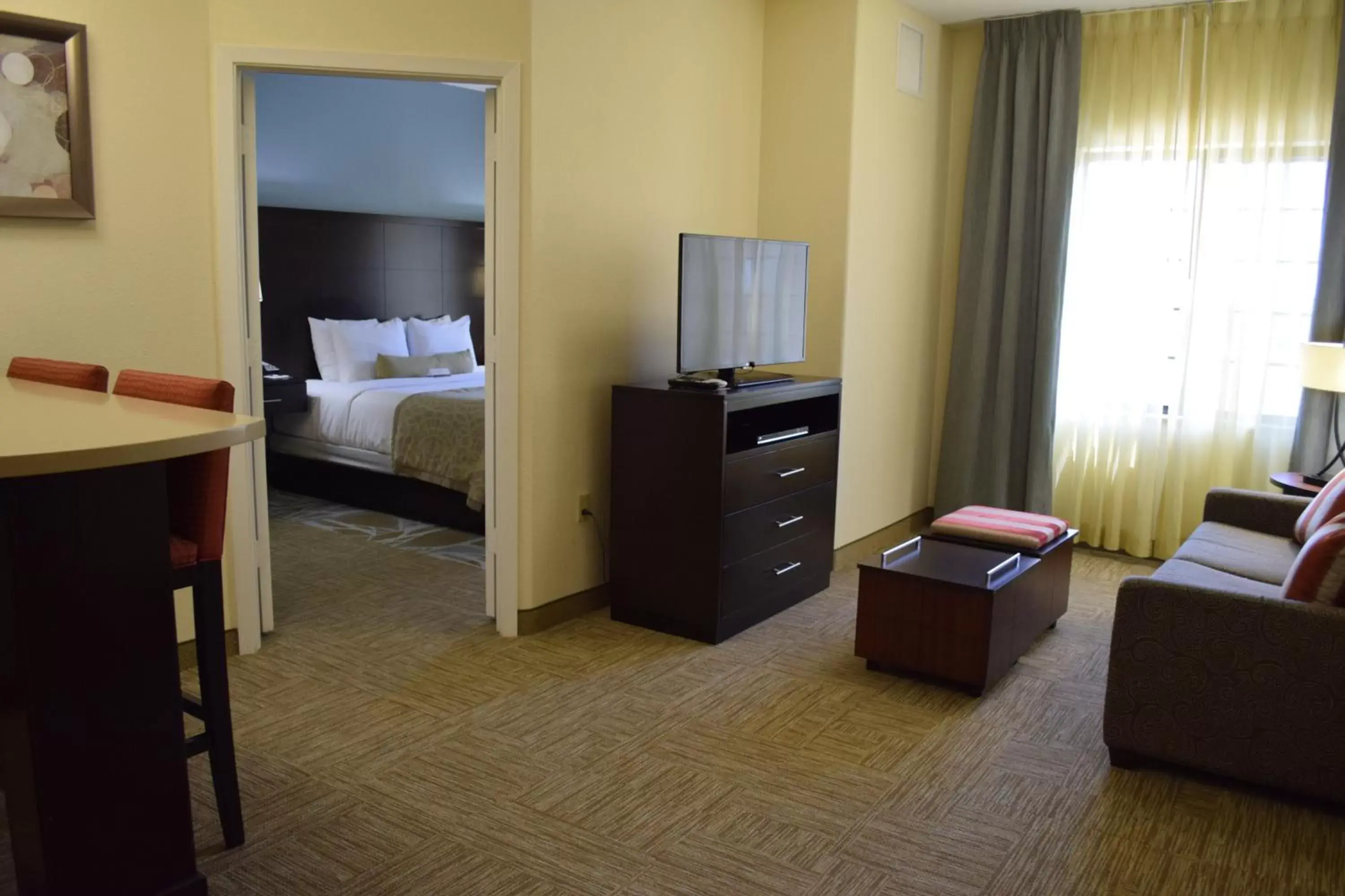 Photo of the whole room, TV/Entertainment Center in Staybridge Suites Houston Stafford - Sugar Land, an IHG Hotel