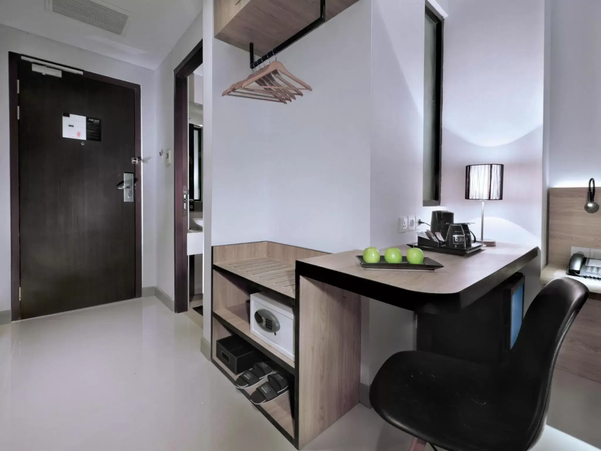 Bedroom, Kitchen/Kitchenette in Hotel Neo Gajah Mada Pontianak by ASTON