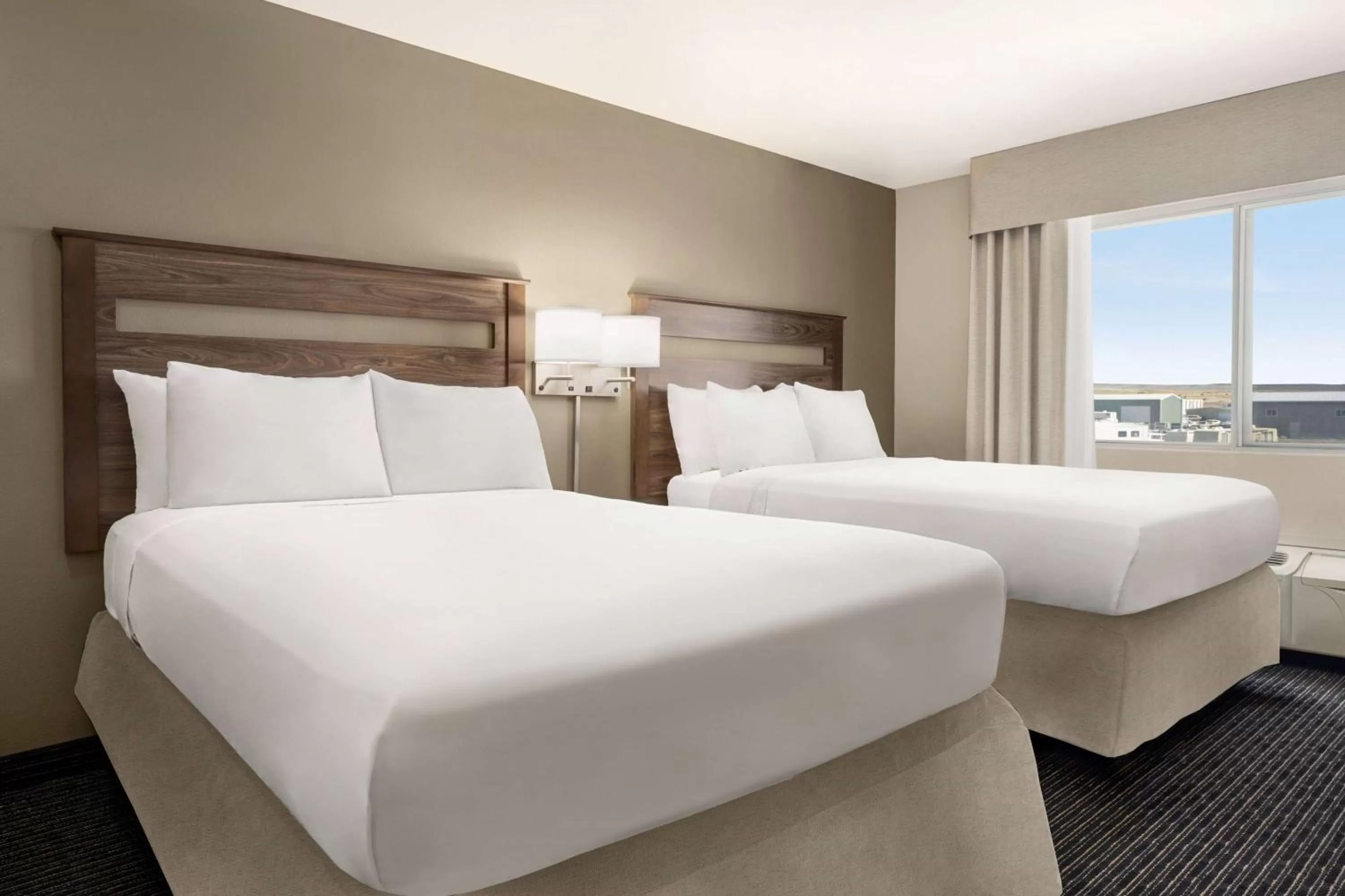 Photo of the whole room, Bed in Baymont by Wyndham Rawlins