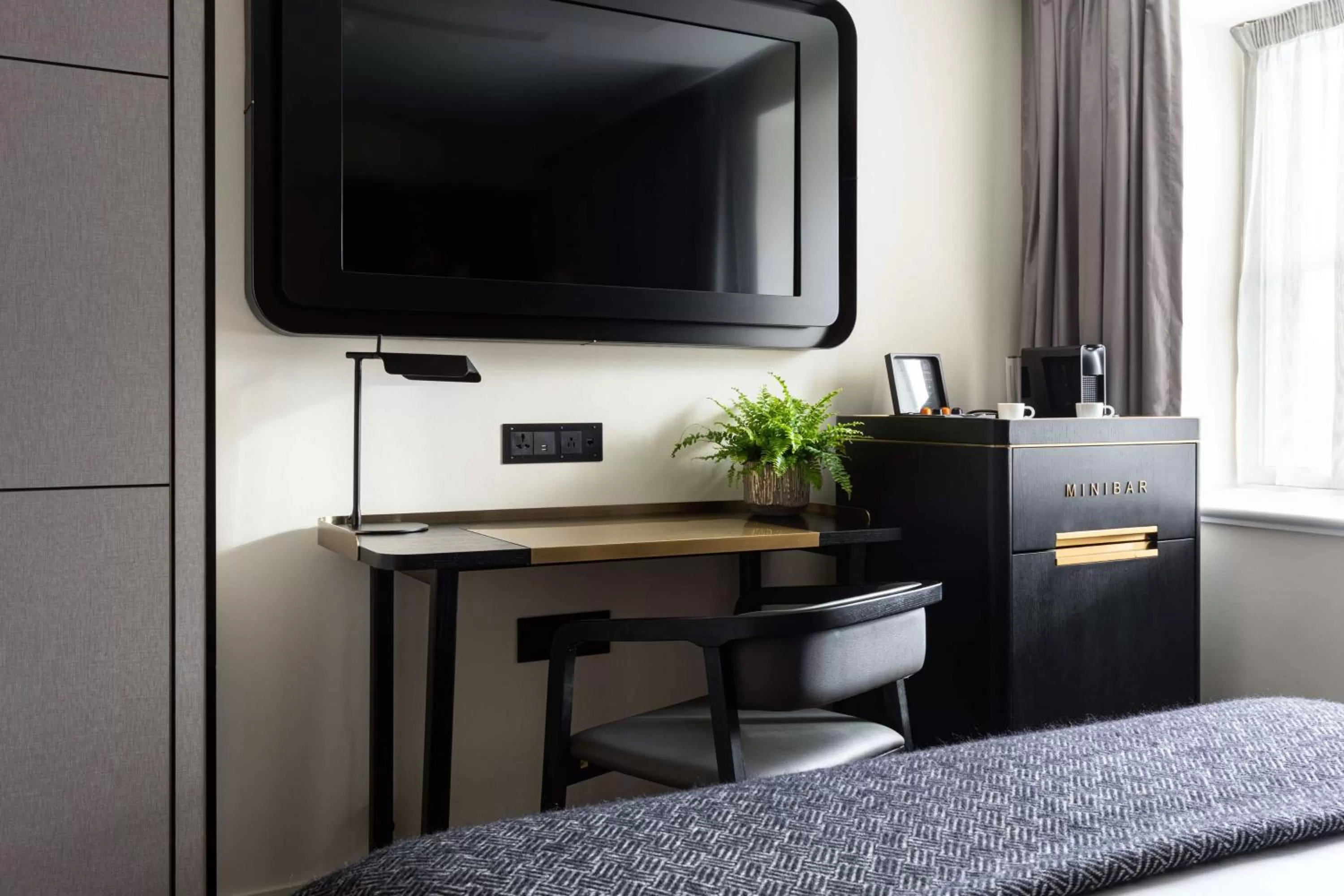 Bedroom in Holmes Hotel London