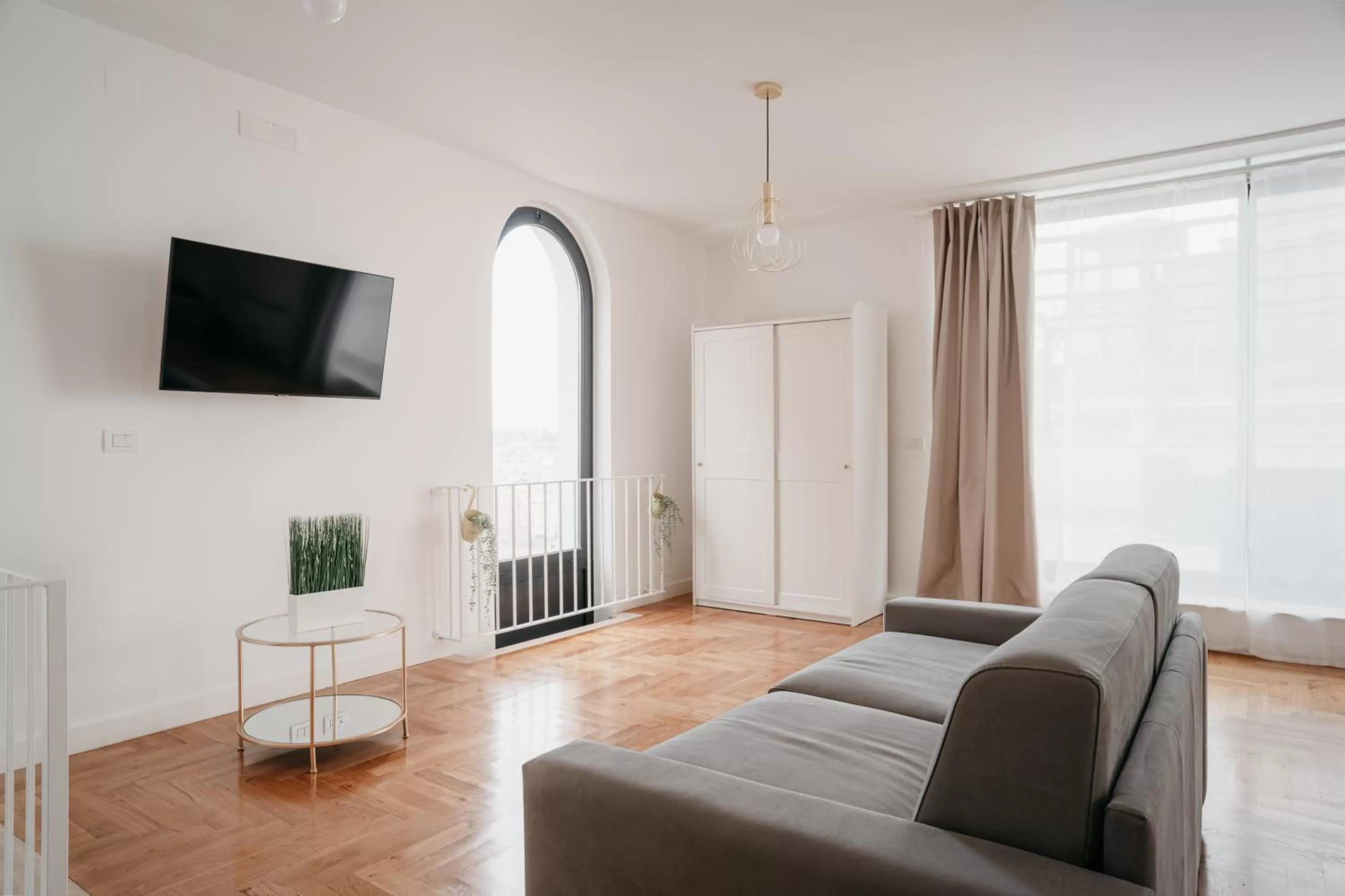 TV and multimedia in Vista Napoli Residence by Casa Napoletana