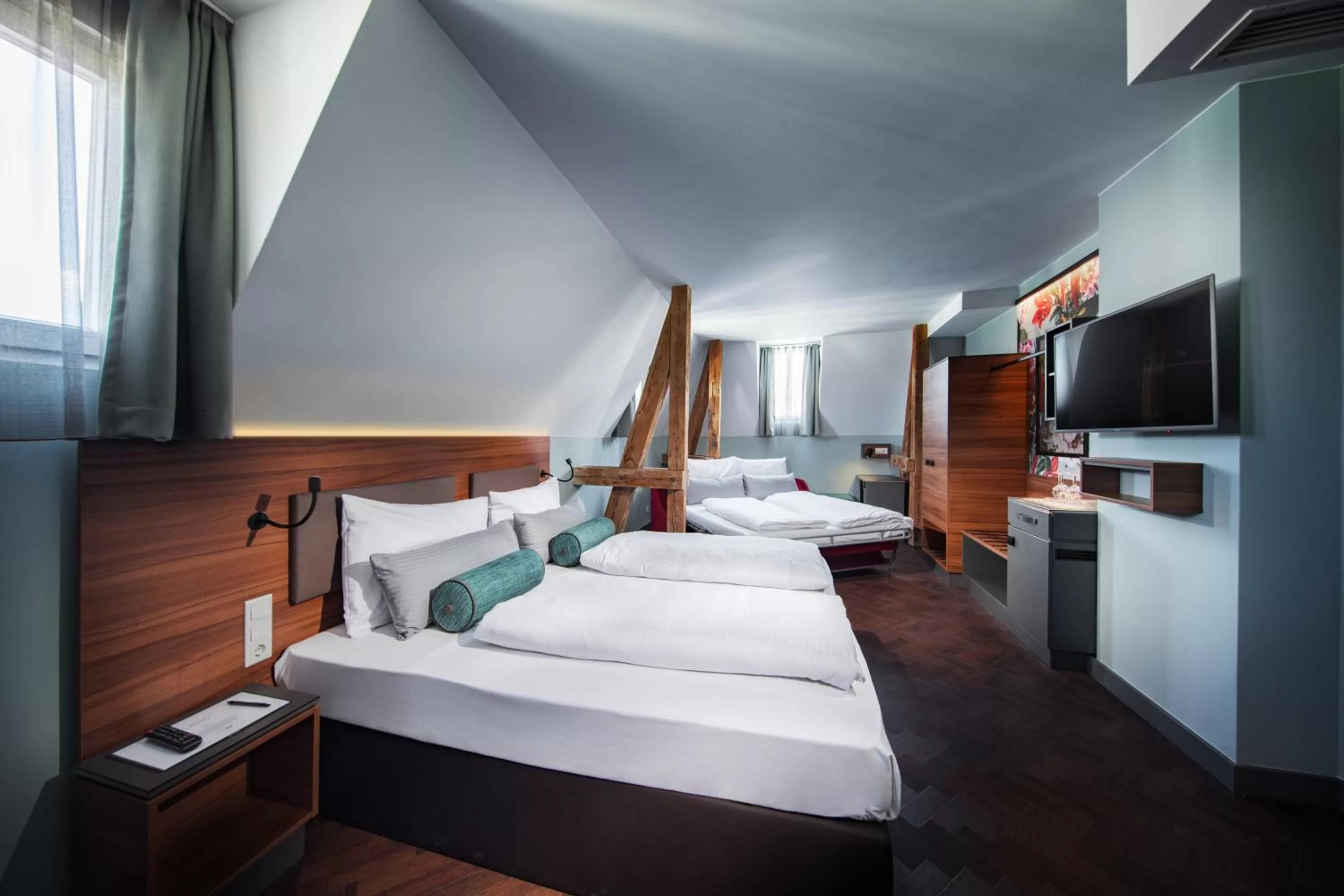 Bed in Maison Schiller by DesignCity Hotels