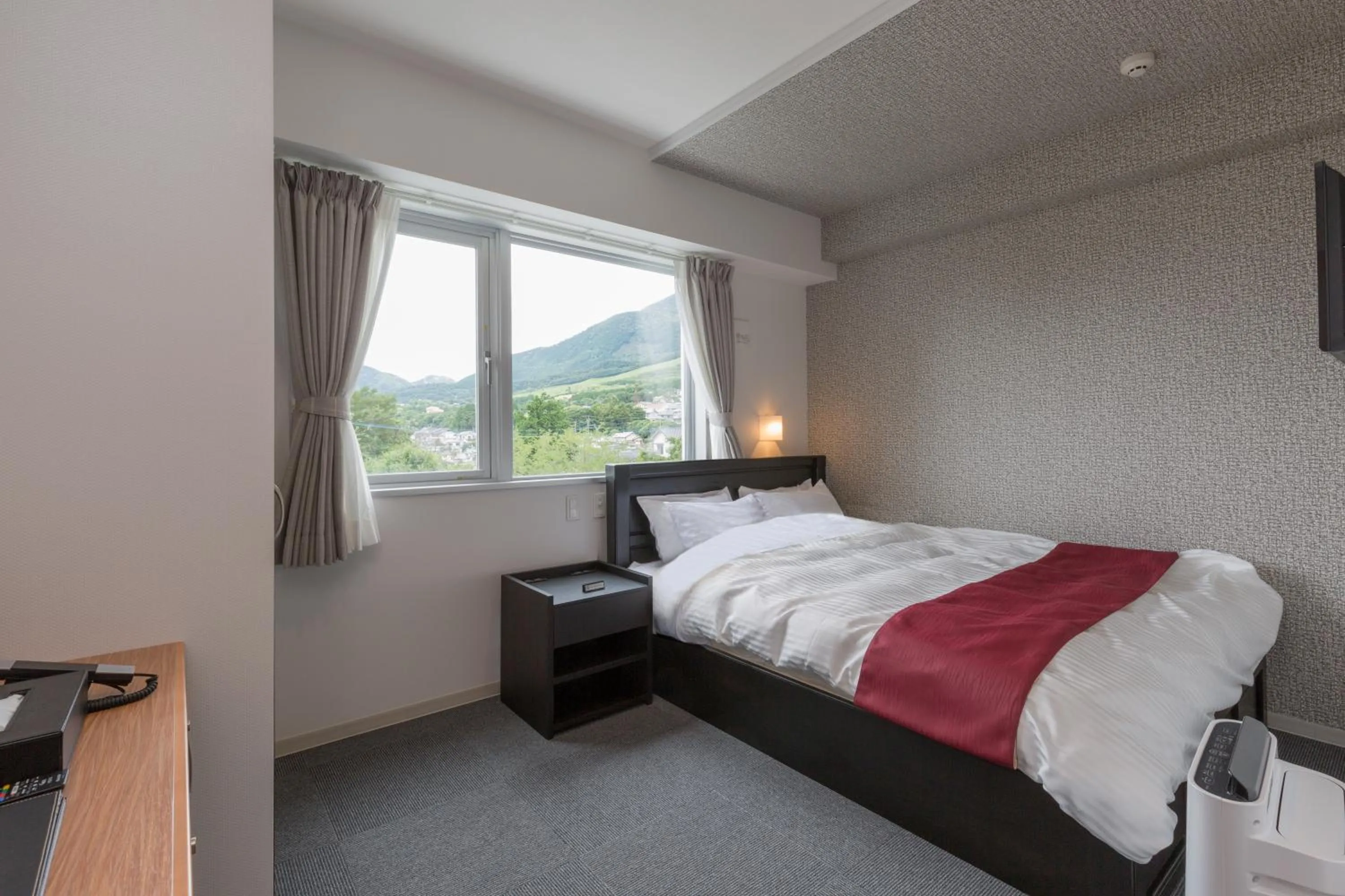 Bed in Morinoyu Resort