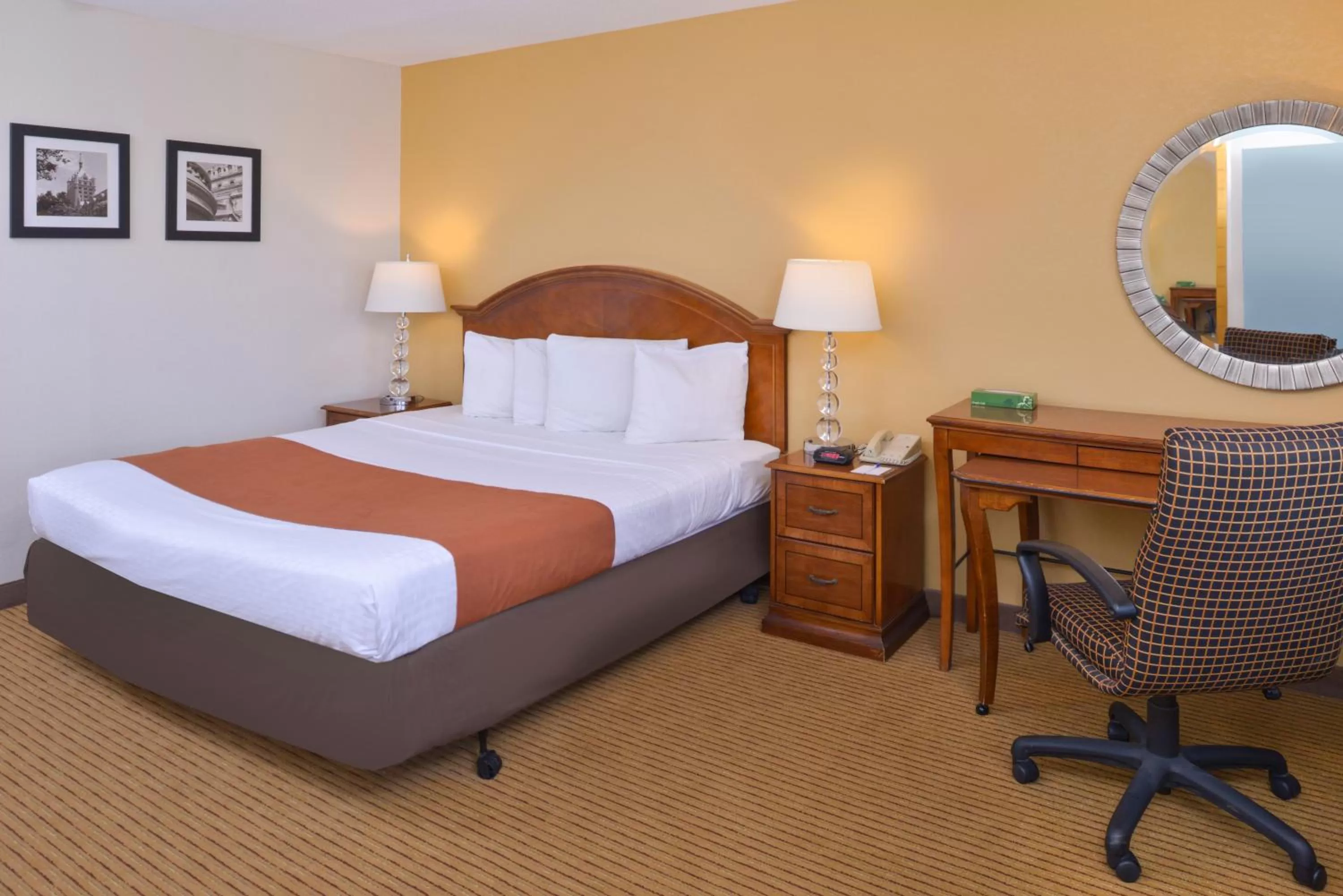Bed in Americas Best Value Inn Plattsburgh