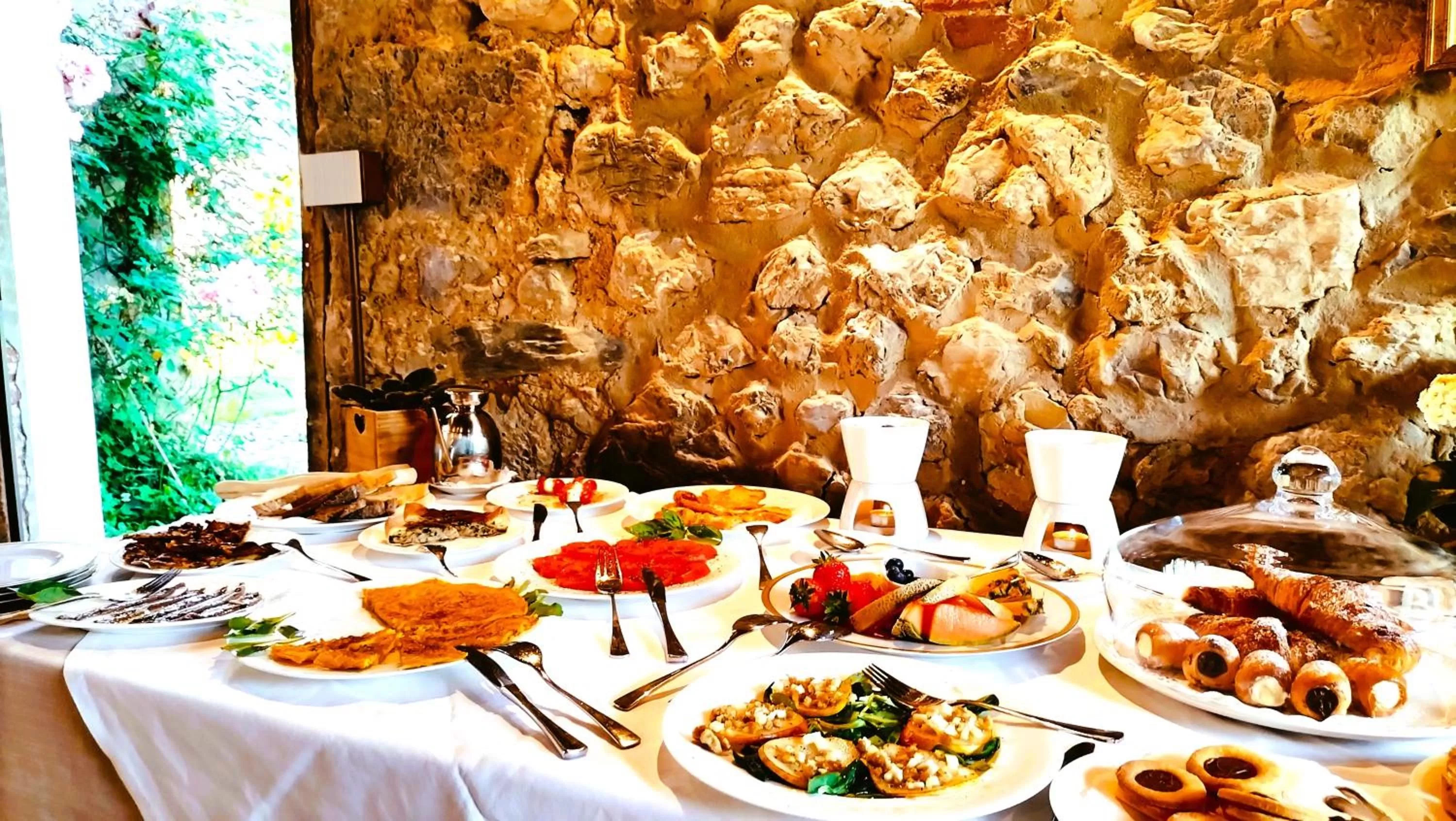 Breakfast in Badia Giulia Prestigious Historical B&B