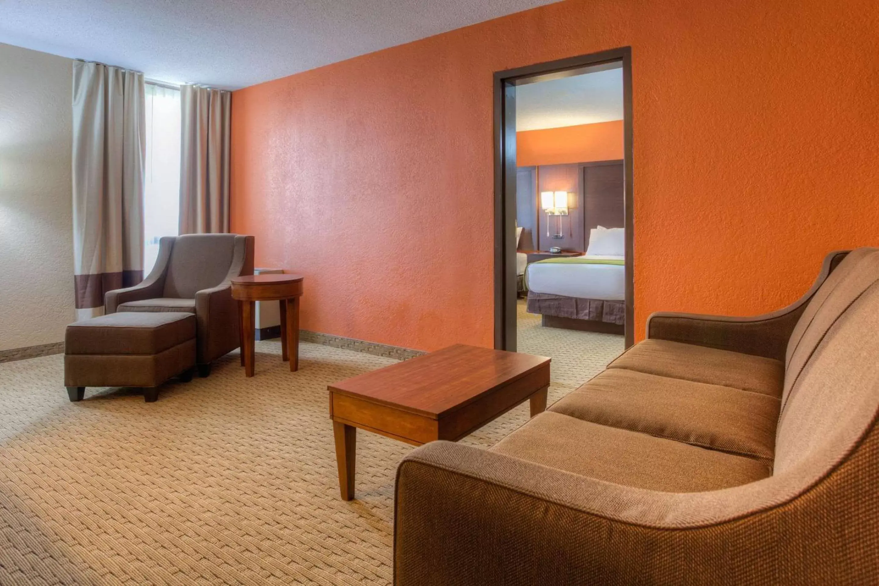 Bedroom, Seating Area in Comfort Inn & Suites Evansville Airport
