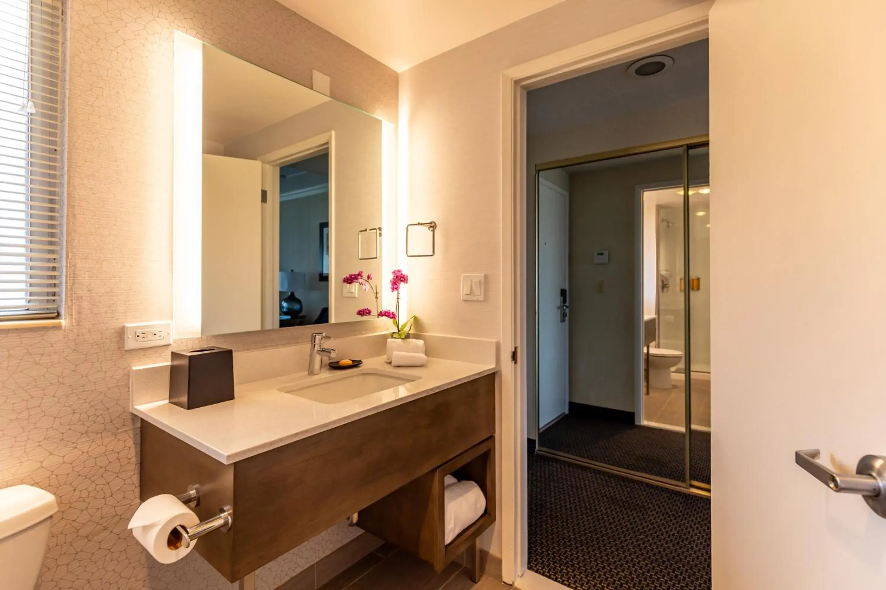 Bathroom in West Beach Inn, a Coast Hotel