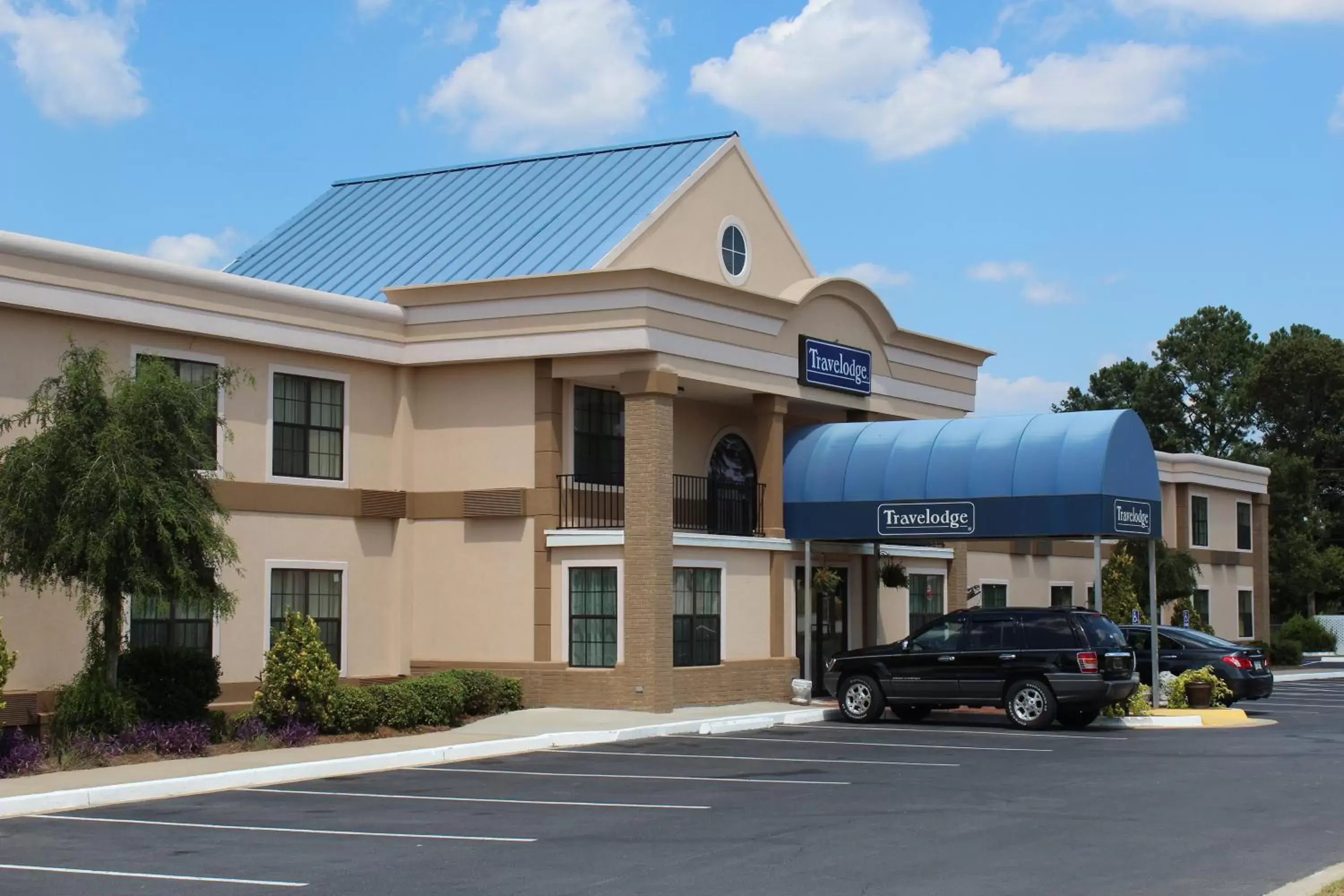 Street view, Property Building in Travelodge by Wyndham Perry GA