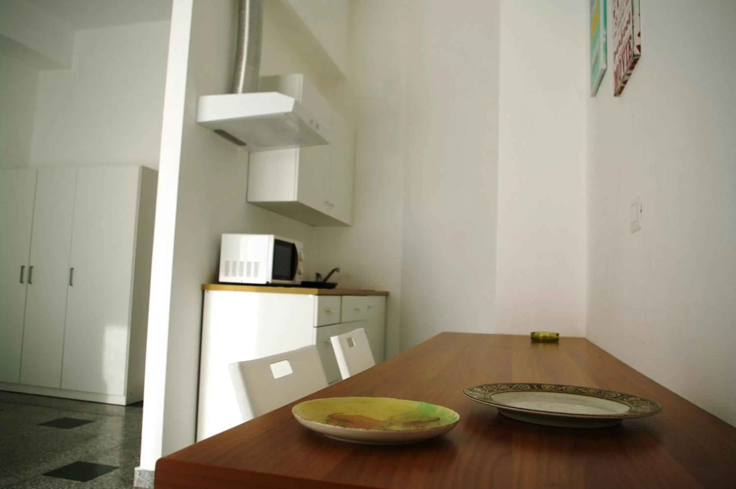 Kitchen or kitchenette, Dining Area in Business Home Piazza Cesare Battisti B&B Residence