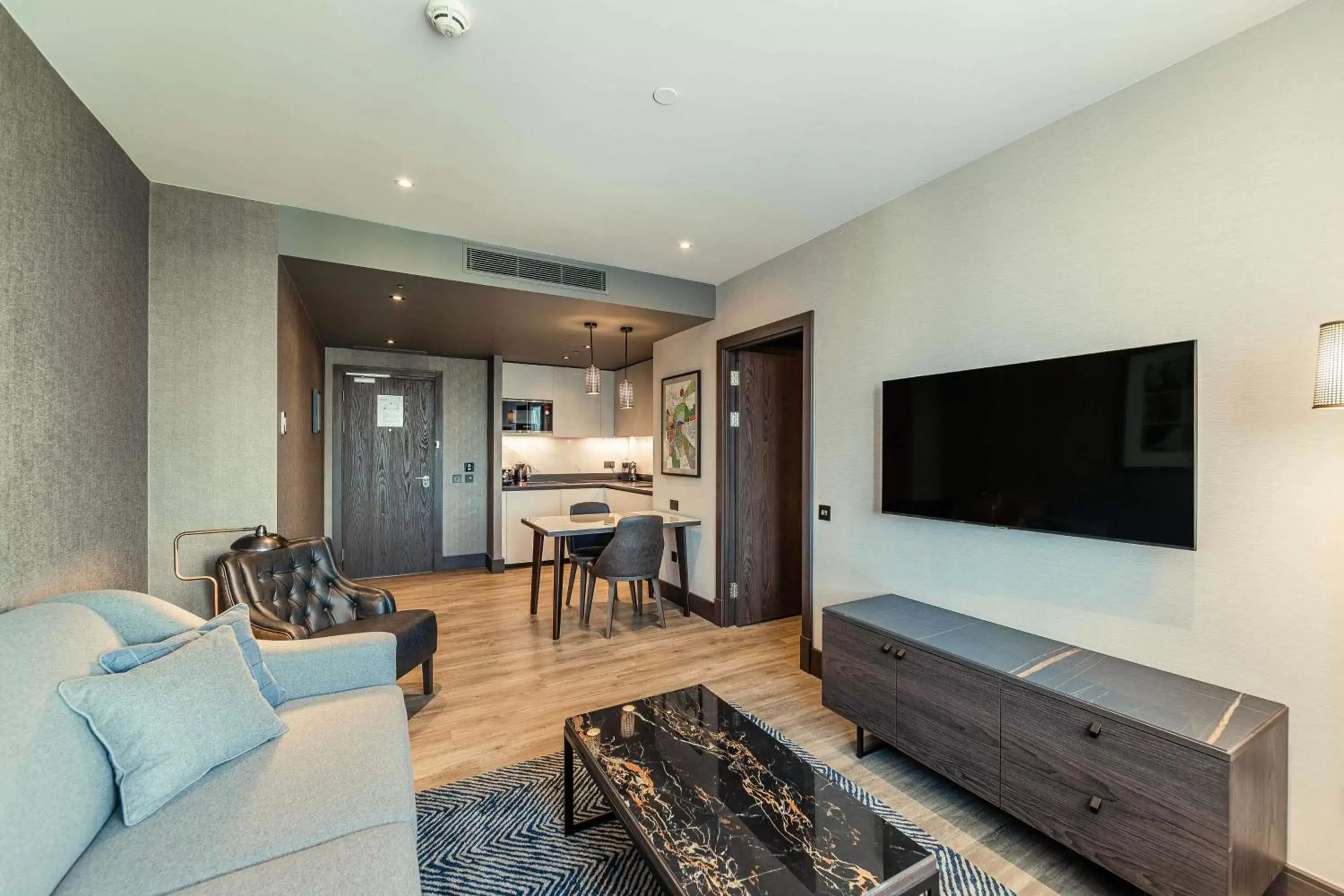 Bedroom, TV/Entertainment Center in The Fellows House Cambridge, Curio Collection By Hilton