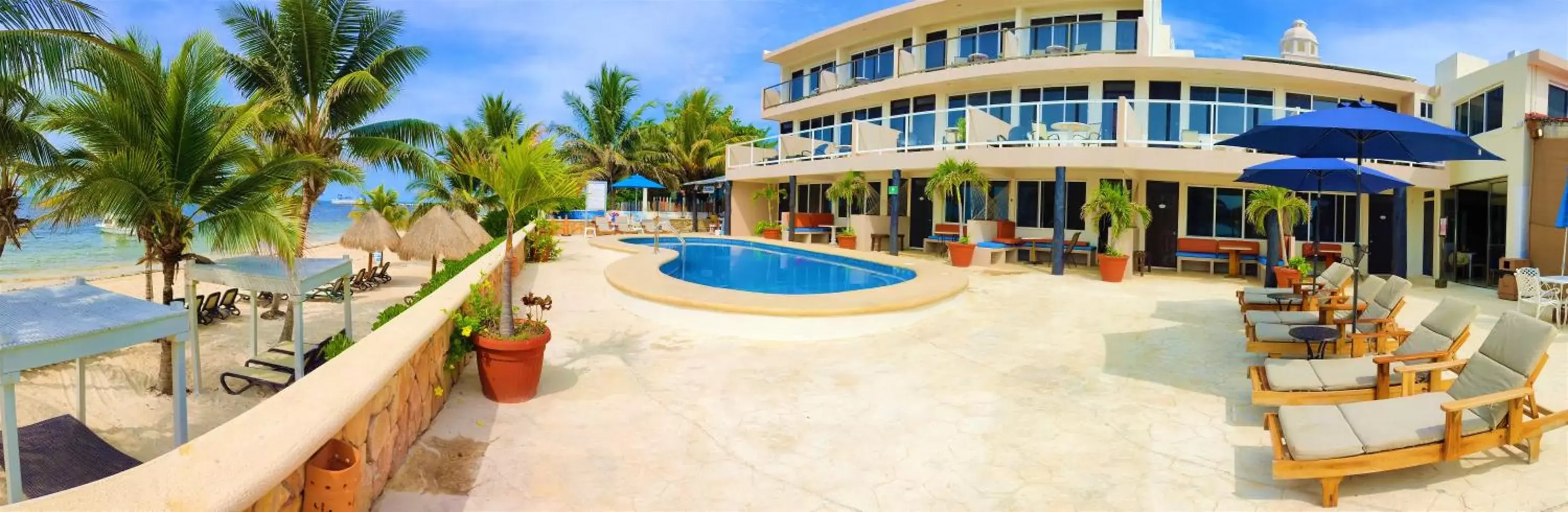 Property building, Swimming Pool in Hacienda Morelos Beachfront Hotel