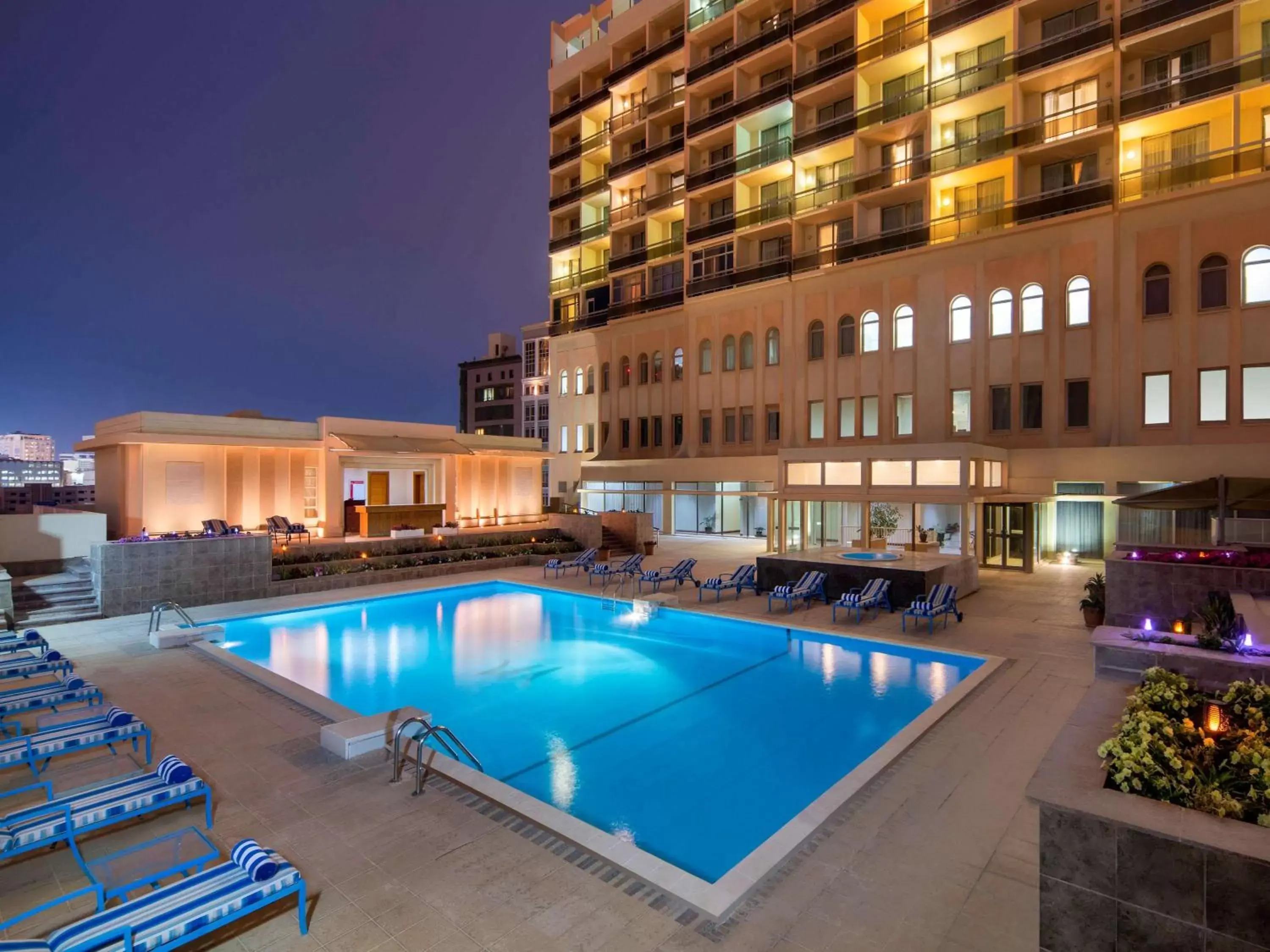 Property building, Swimming Pool in M Grand Hotel Doha