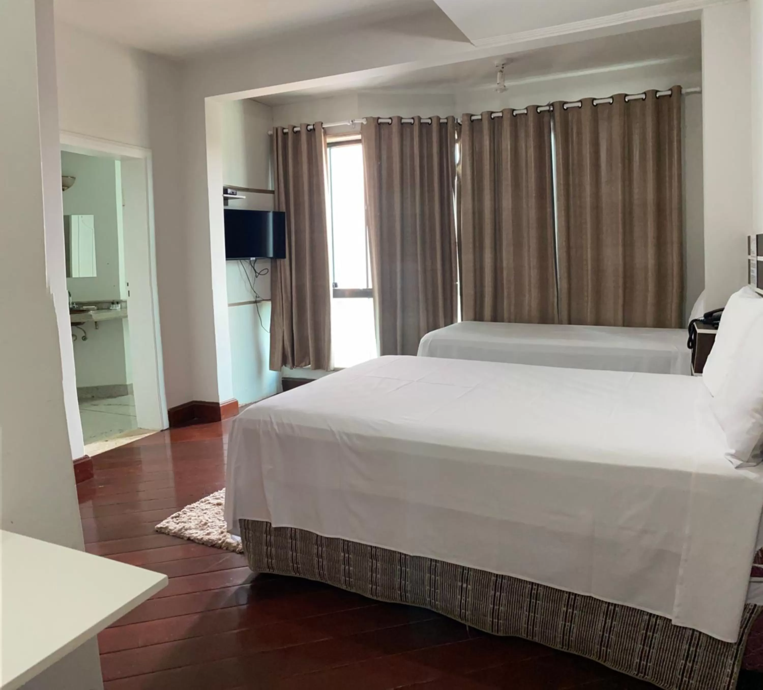 Bed in SAMIR HOTEL COMFORT