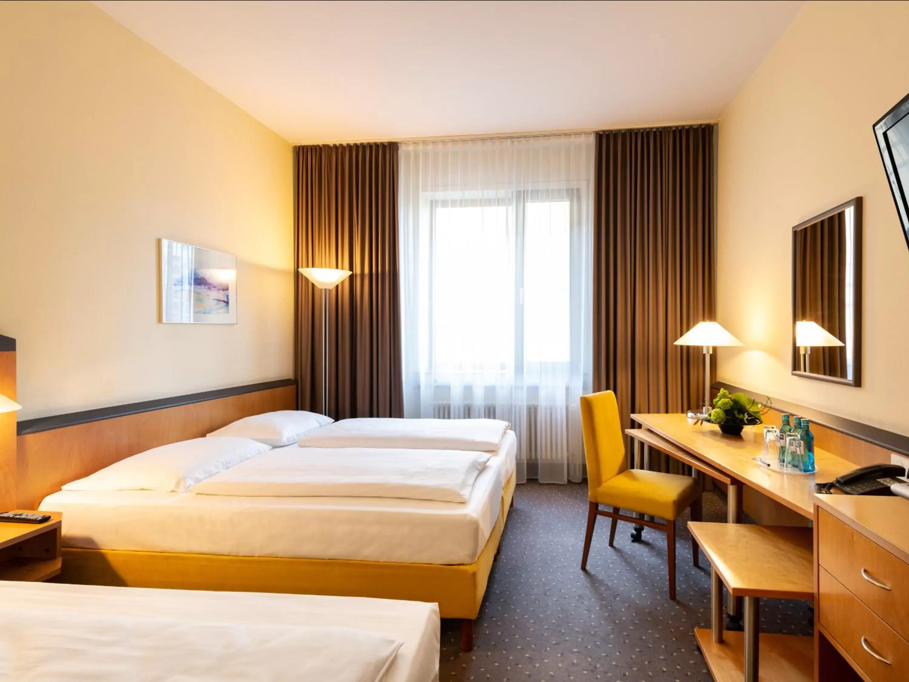 Bed in Plaza Hotel & Living Frankfurt