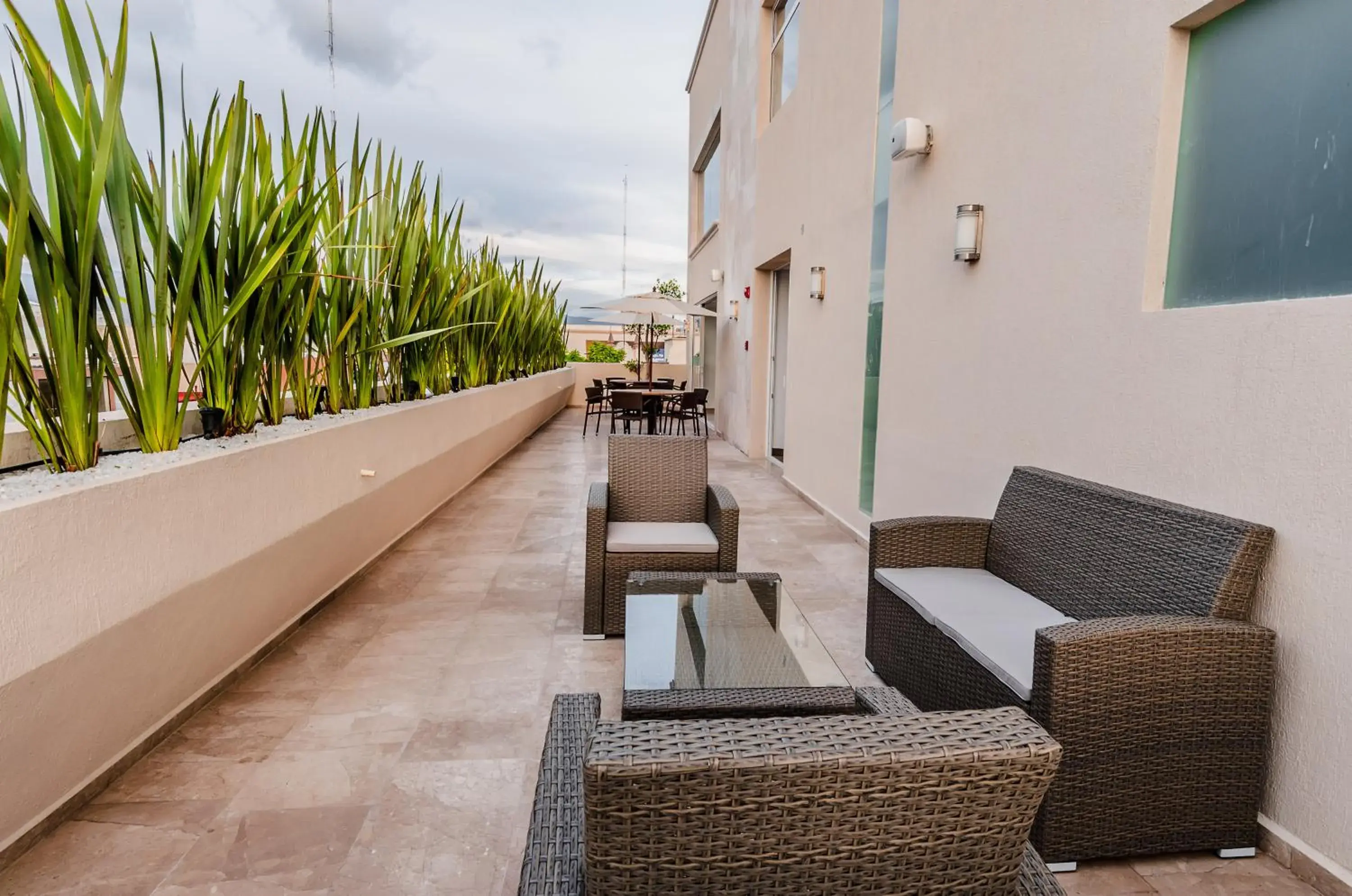 Communal lounge/ TV room, Balcony/Terrace in Hotel Zenith