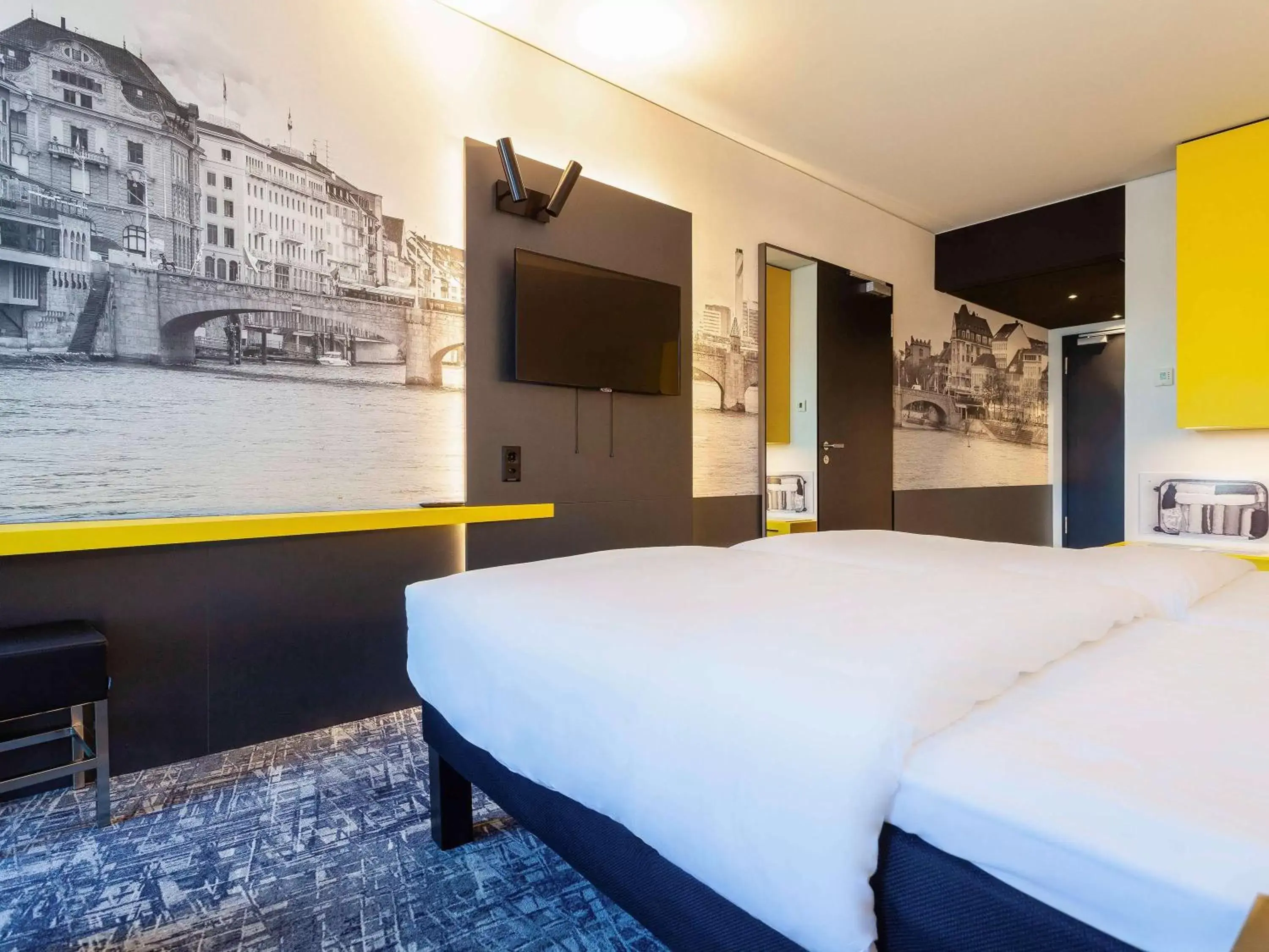 Photo of the whole room in ibis Styles Basel City