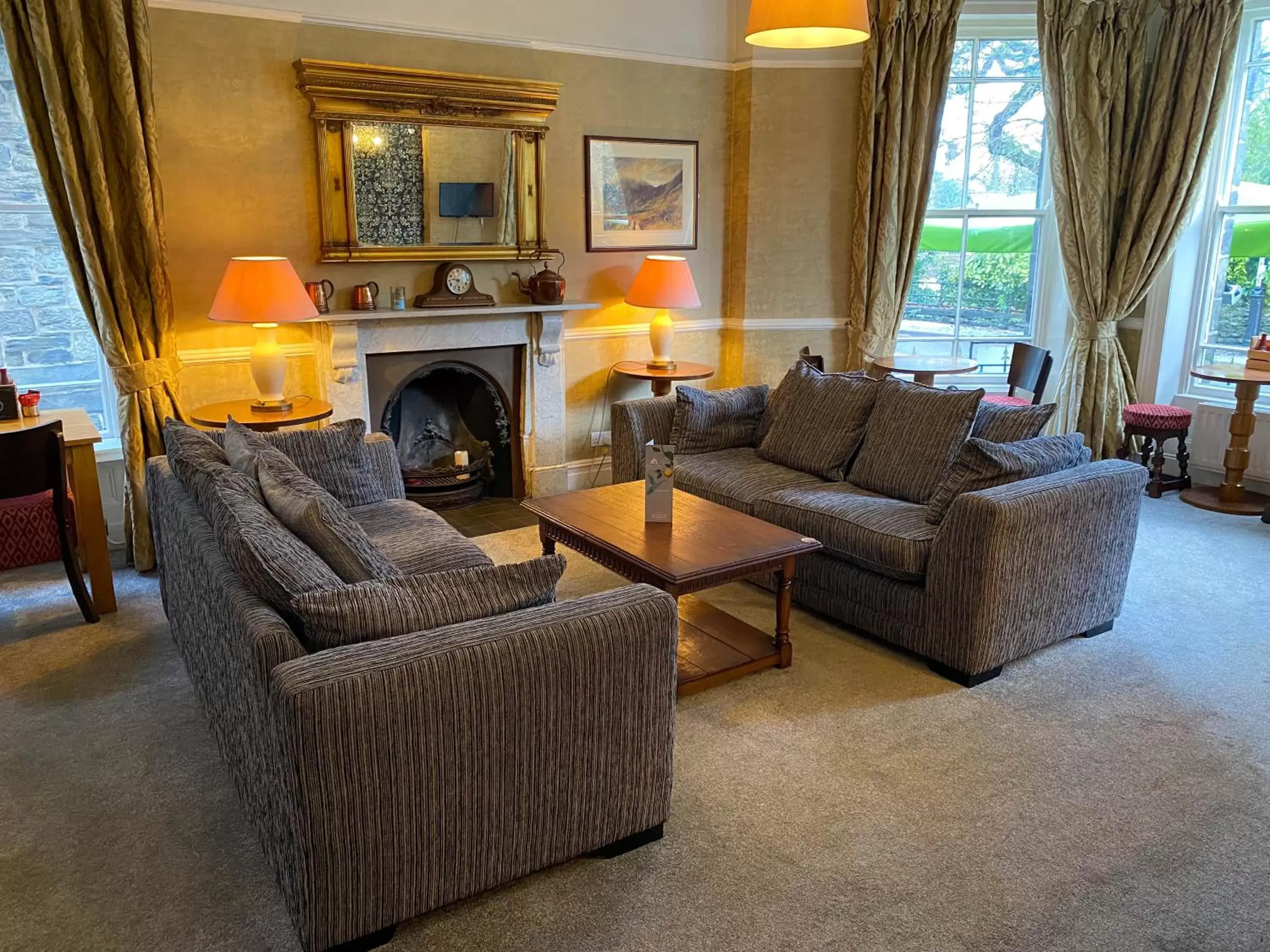 Communal lounge/ TV room, Seating Area in Glan Aber Hotel