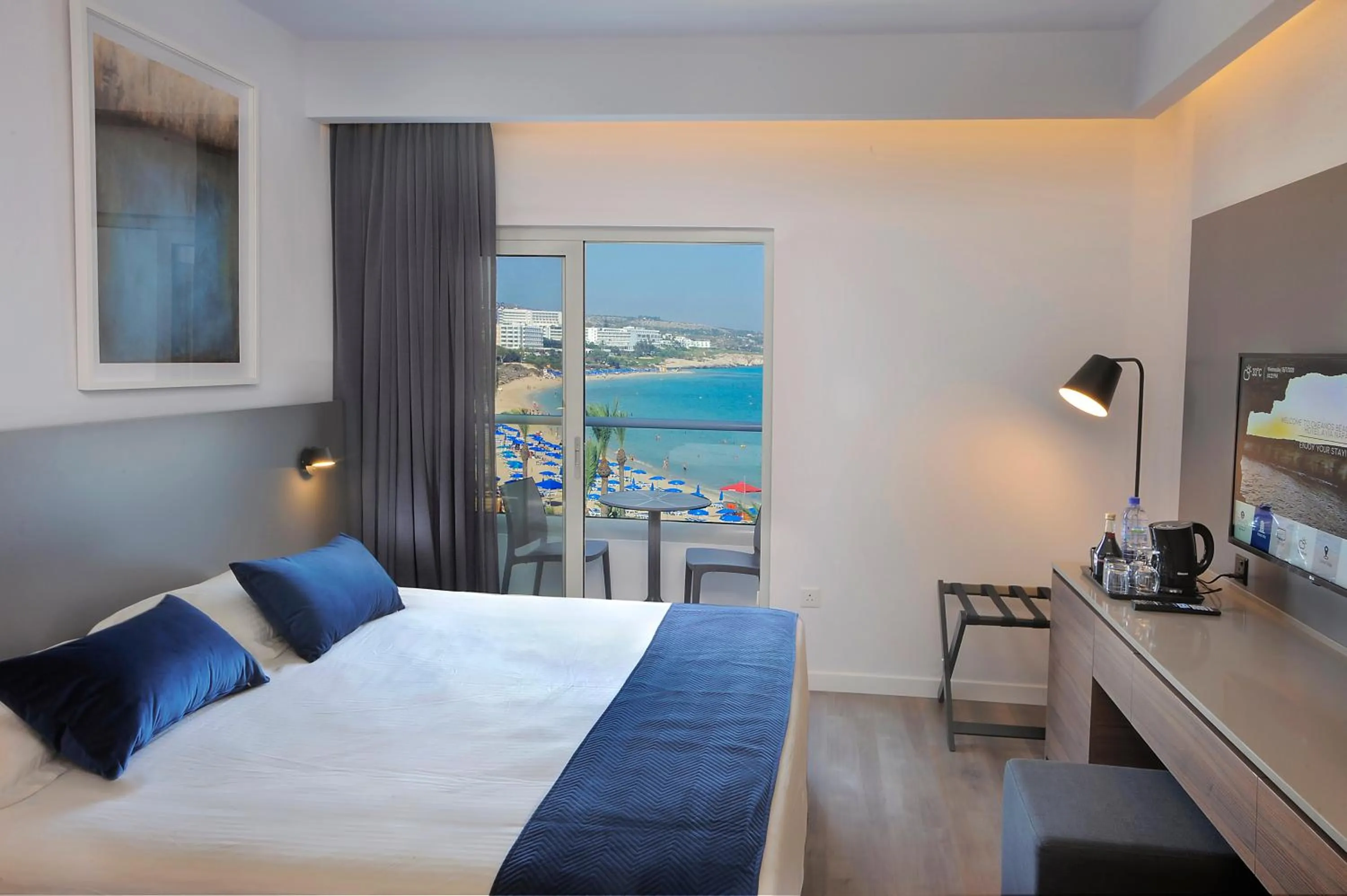 Bed in Okeanos Beach Boutique Hotel