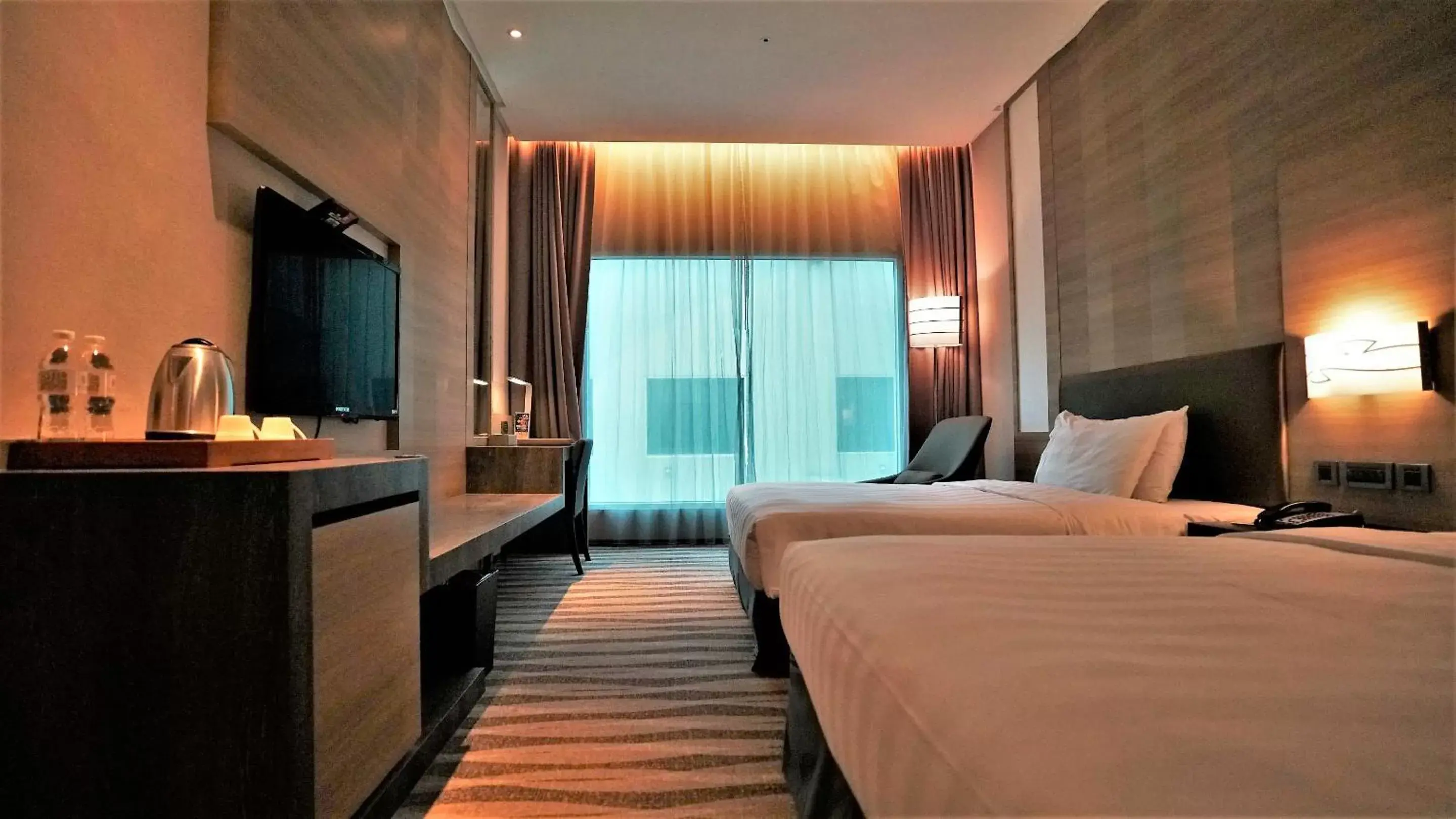 Photo of the whole room, Bed in City Suites - Kaohsiung Chenai Photo of the whole room, Bed in City Suites - Kaohsiung Chenai