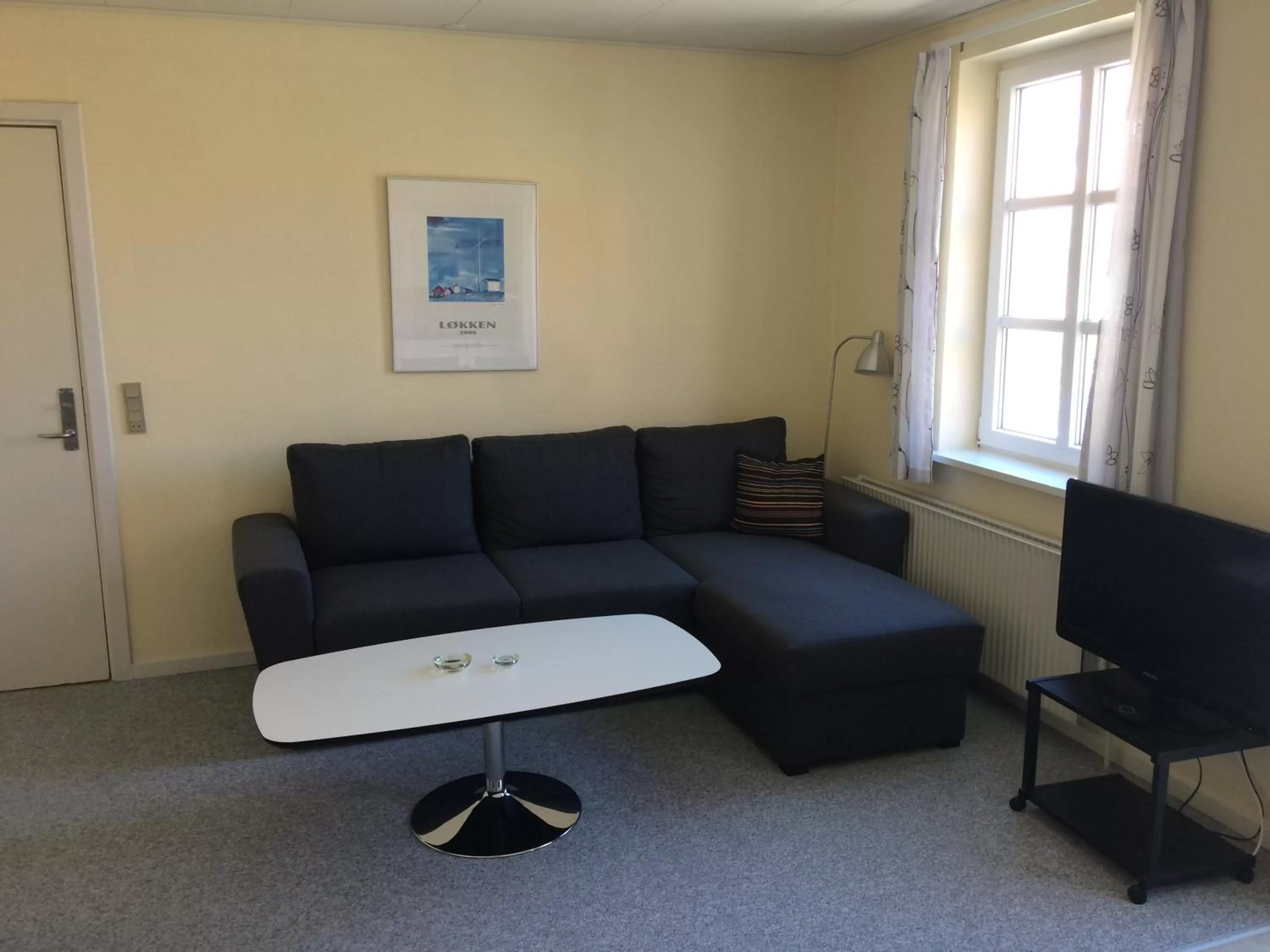 Living room in Løkken Badehotel Apartments