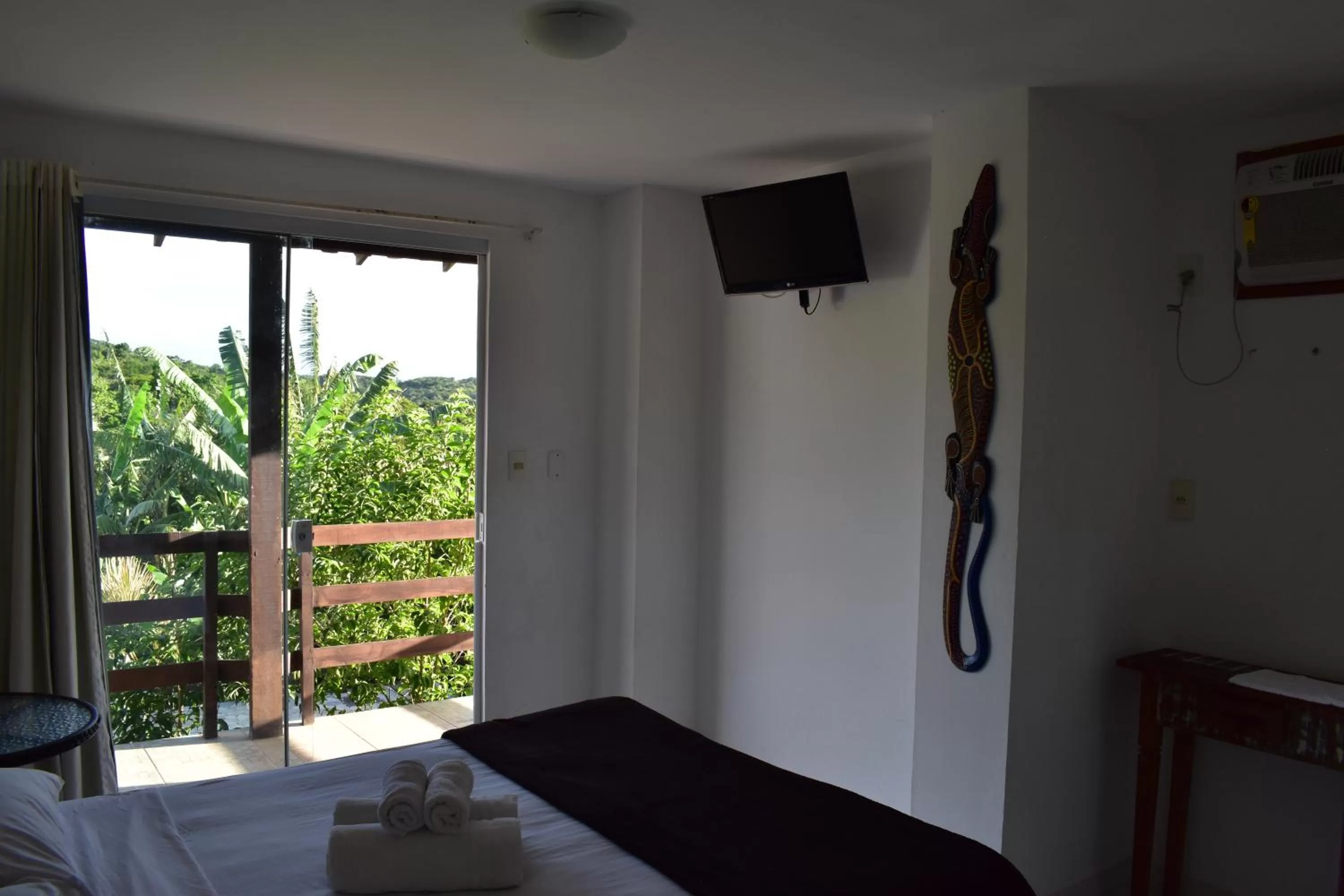 Garden view, Bed in pousada CASA 29 BÚZIOS