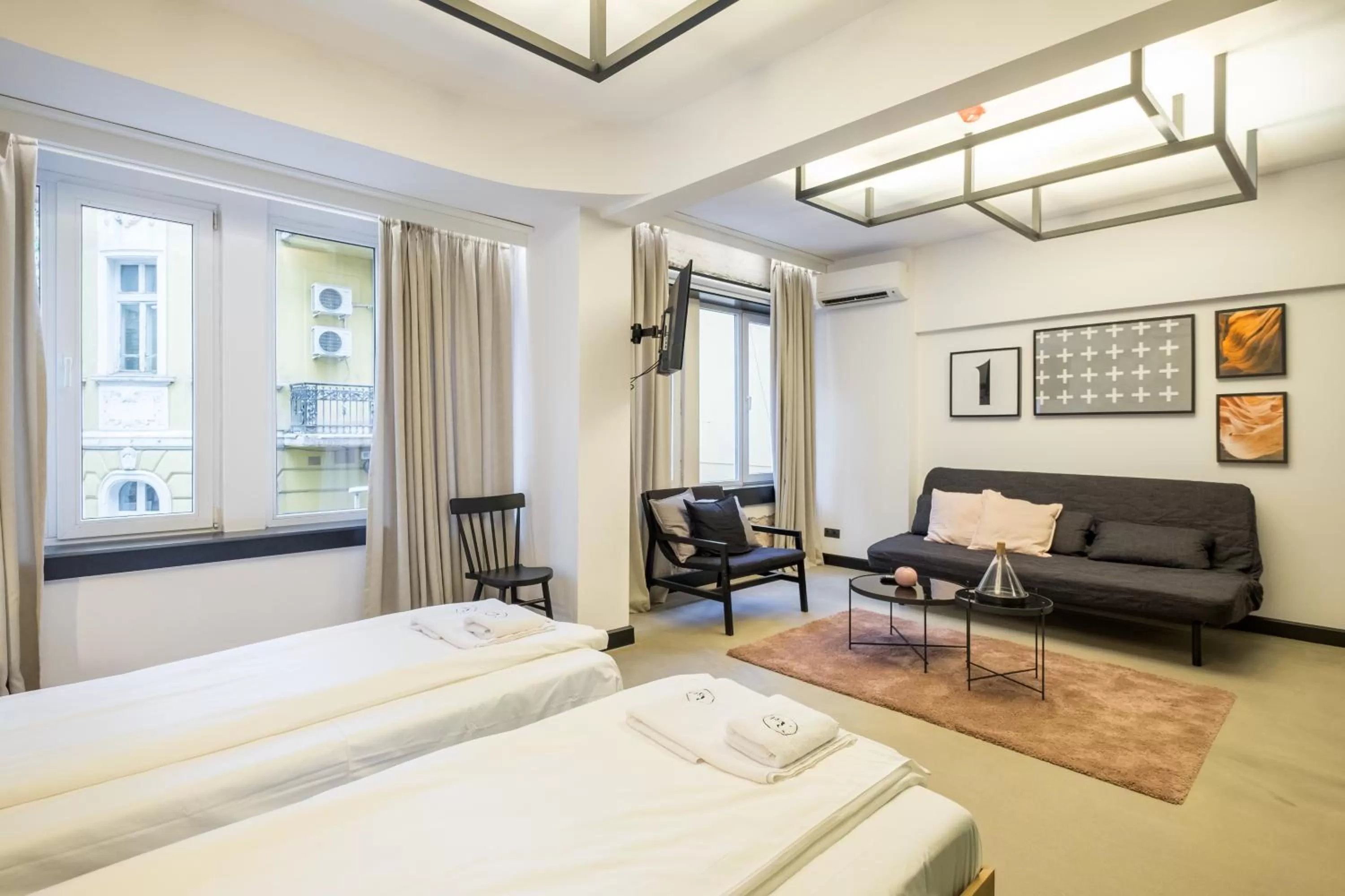 Bed in R34 Boutique Hotel