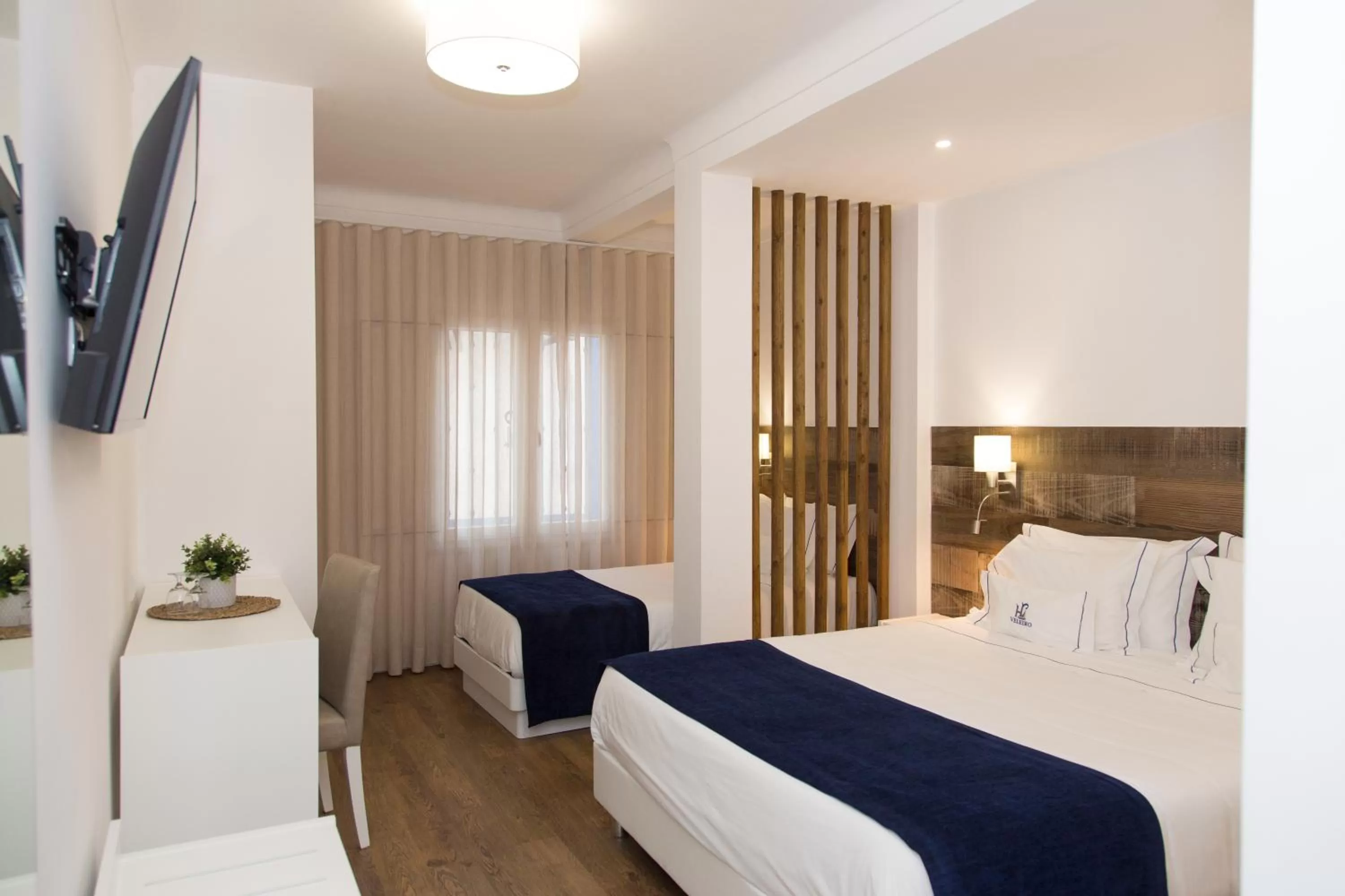 Bed in Hotel Veleiro