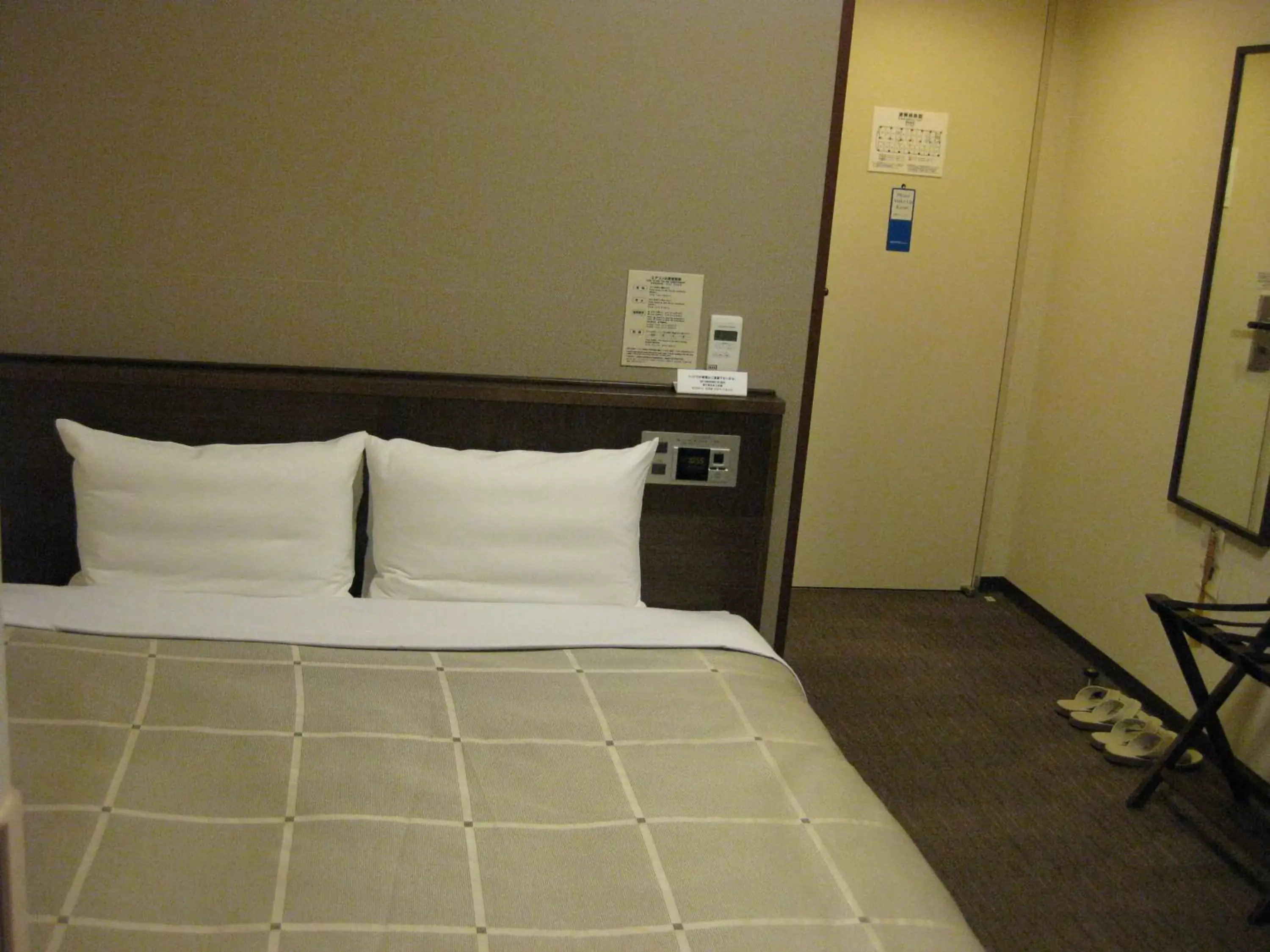 Bed in Hotel Route-Inn Higashimuroran Ekimae