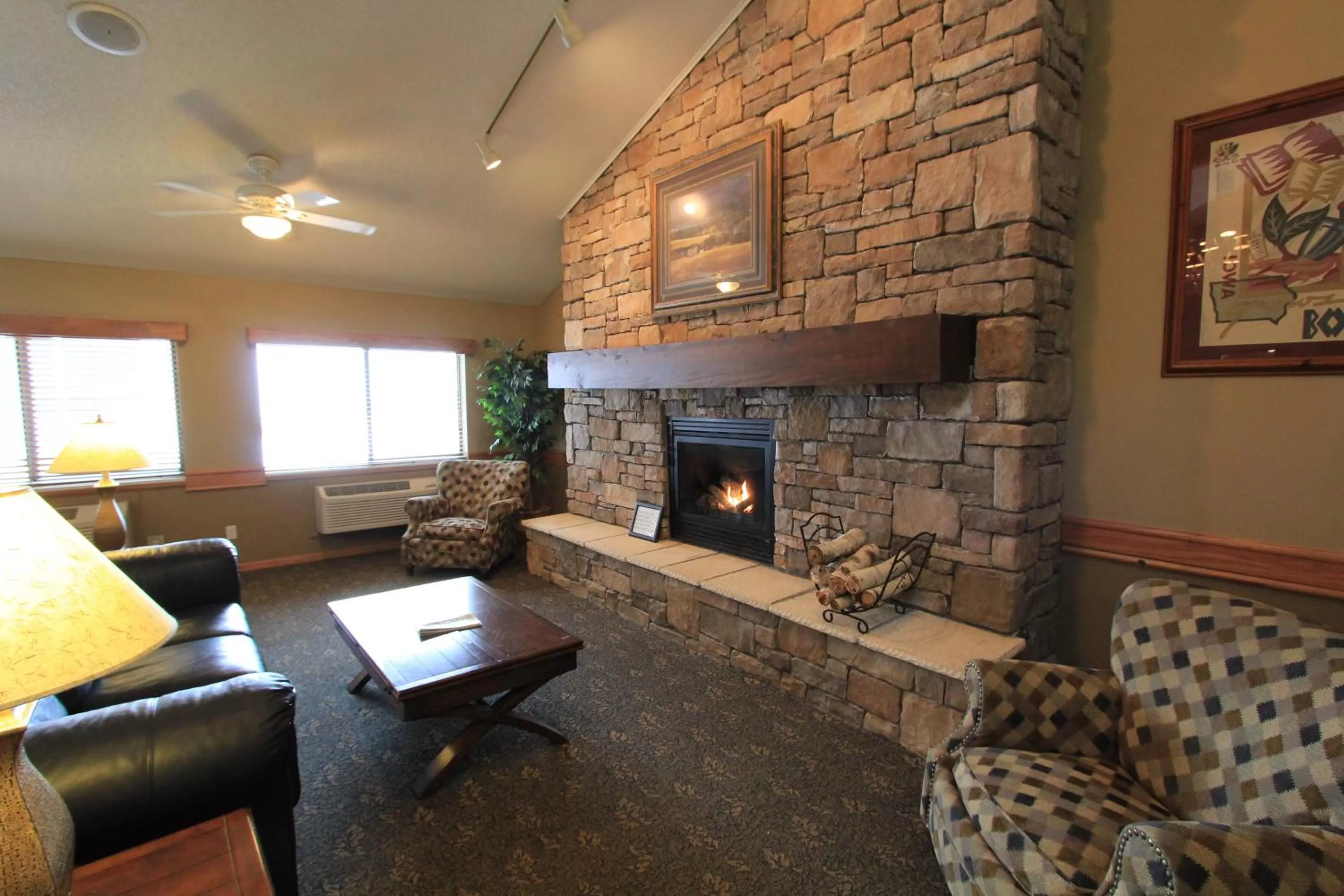 Living room in AmericInn by Wyndham Cedar Rapids Airport
