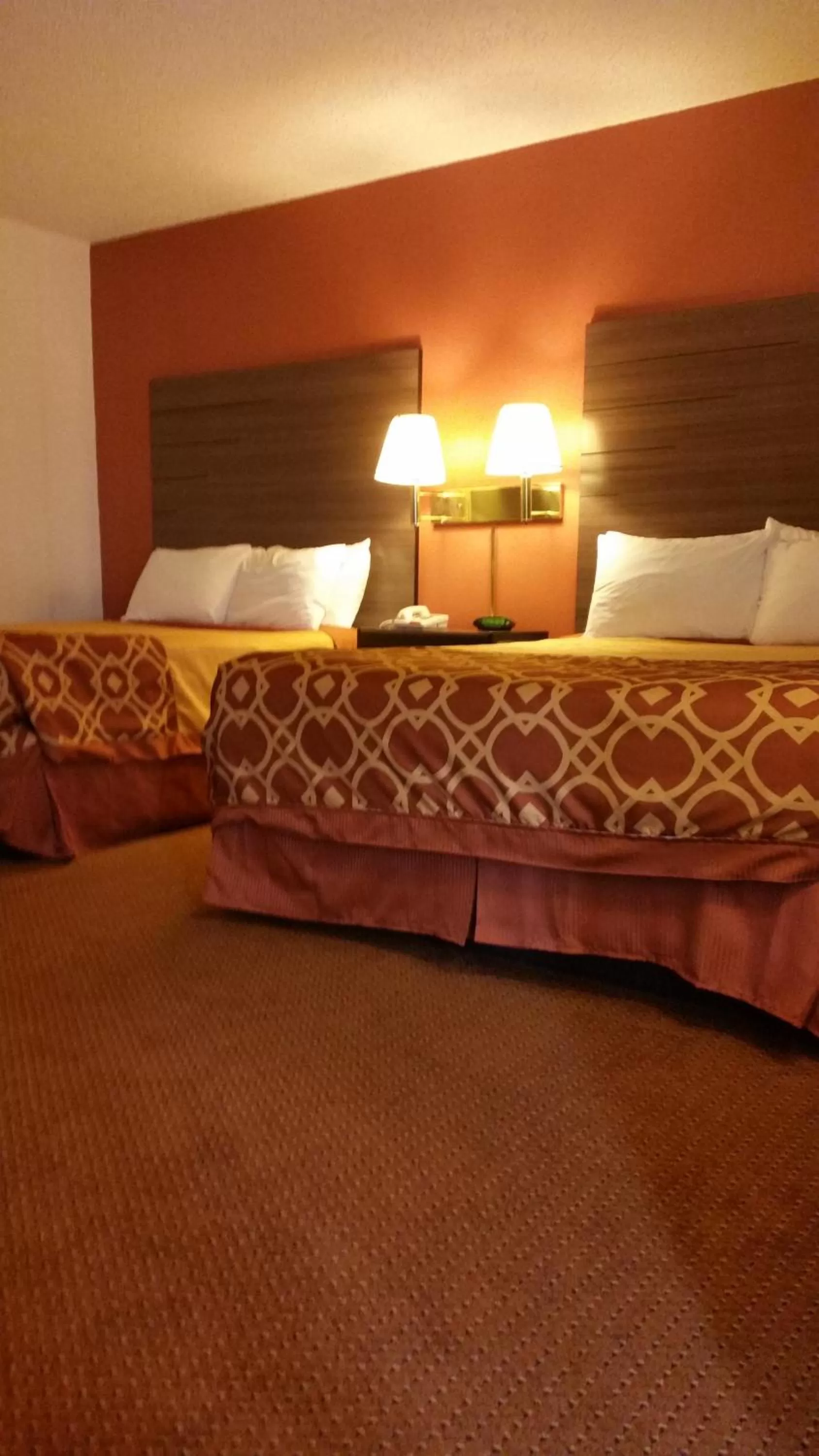 Bed in American Inn Of Liberal