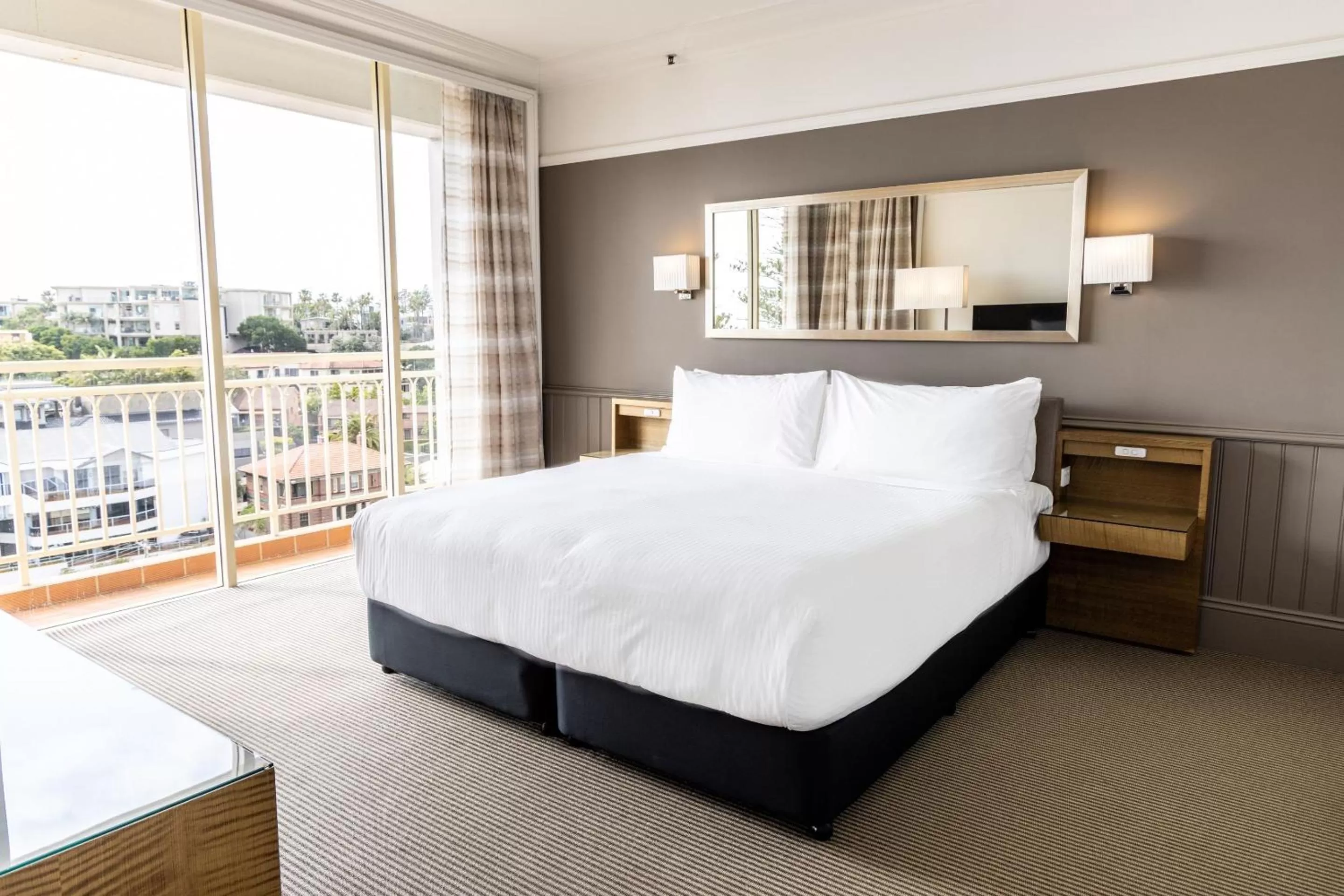 Photo of the whole room, Bed in Crowne Plaza Terrigal Pacific by IHG
