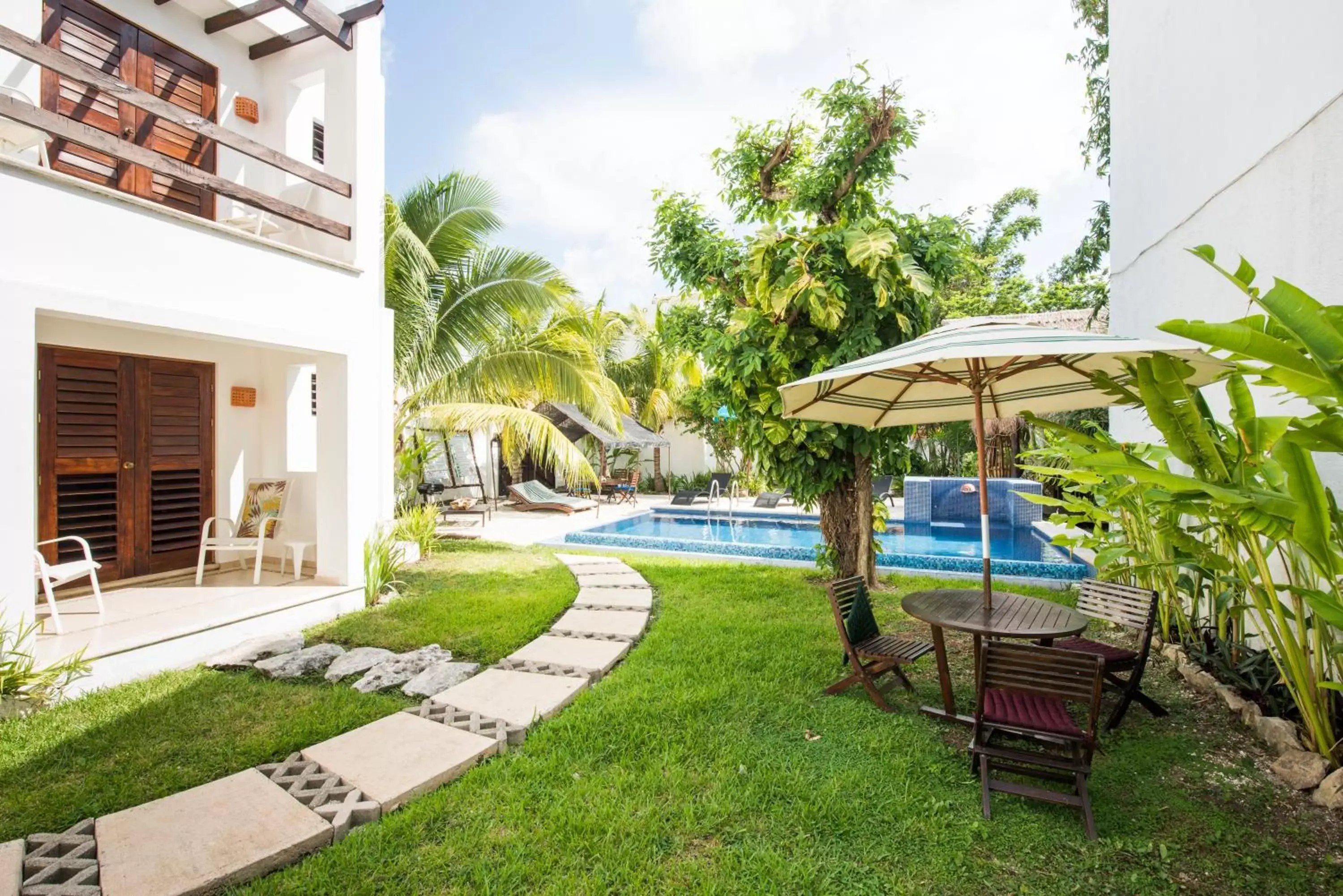 Garden, Swimming Pool in Villas El Encanto Cozumel