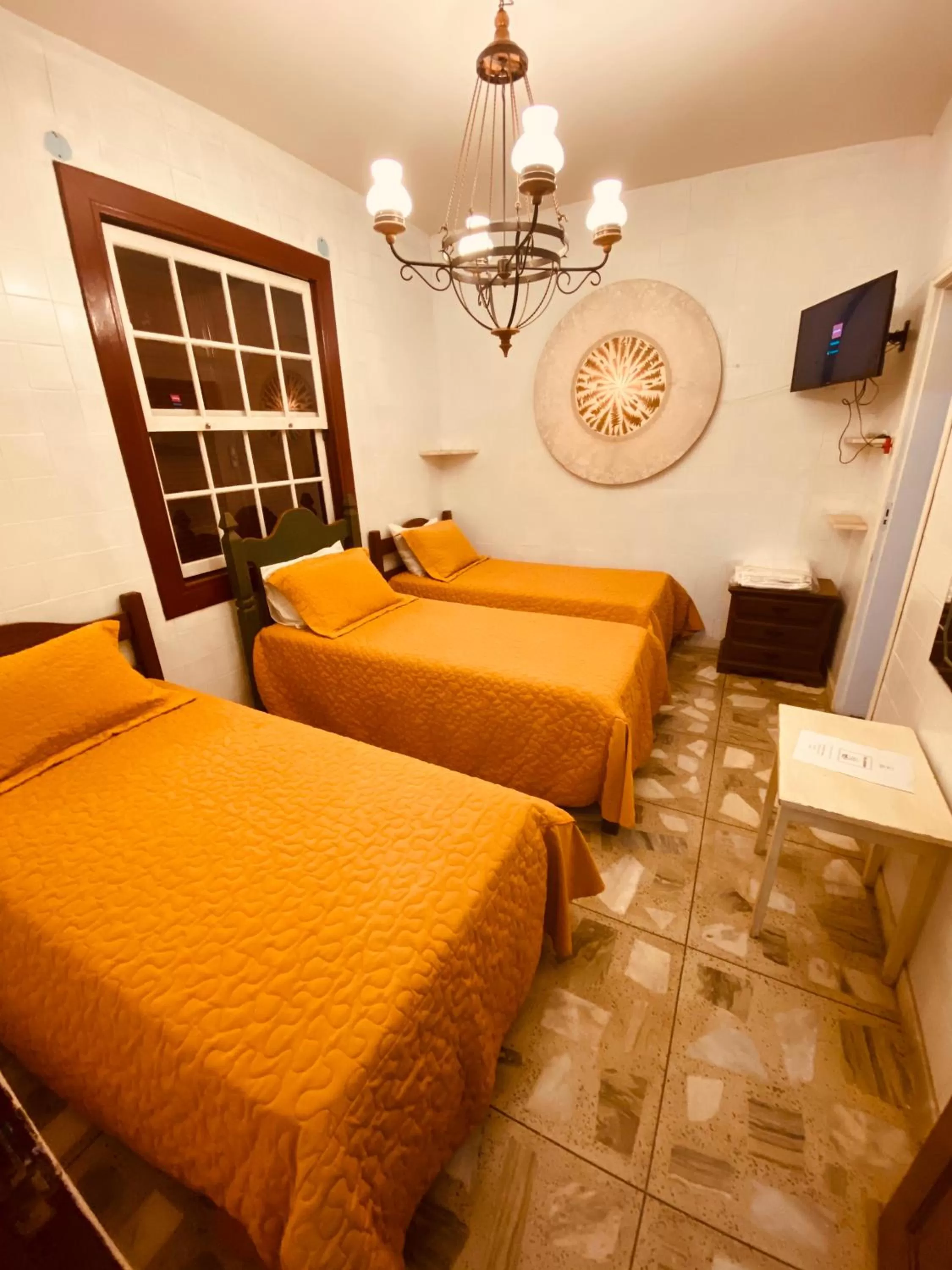 Bed in POUSADA CHARLOTTE