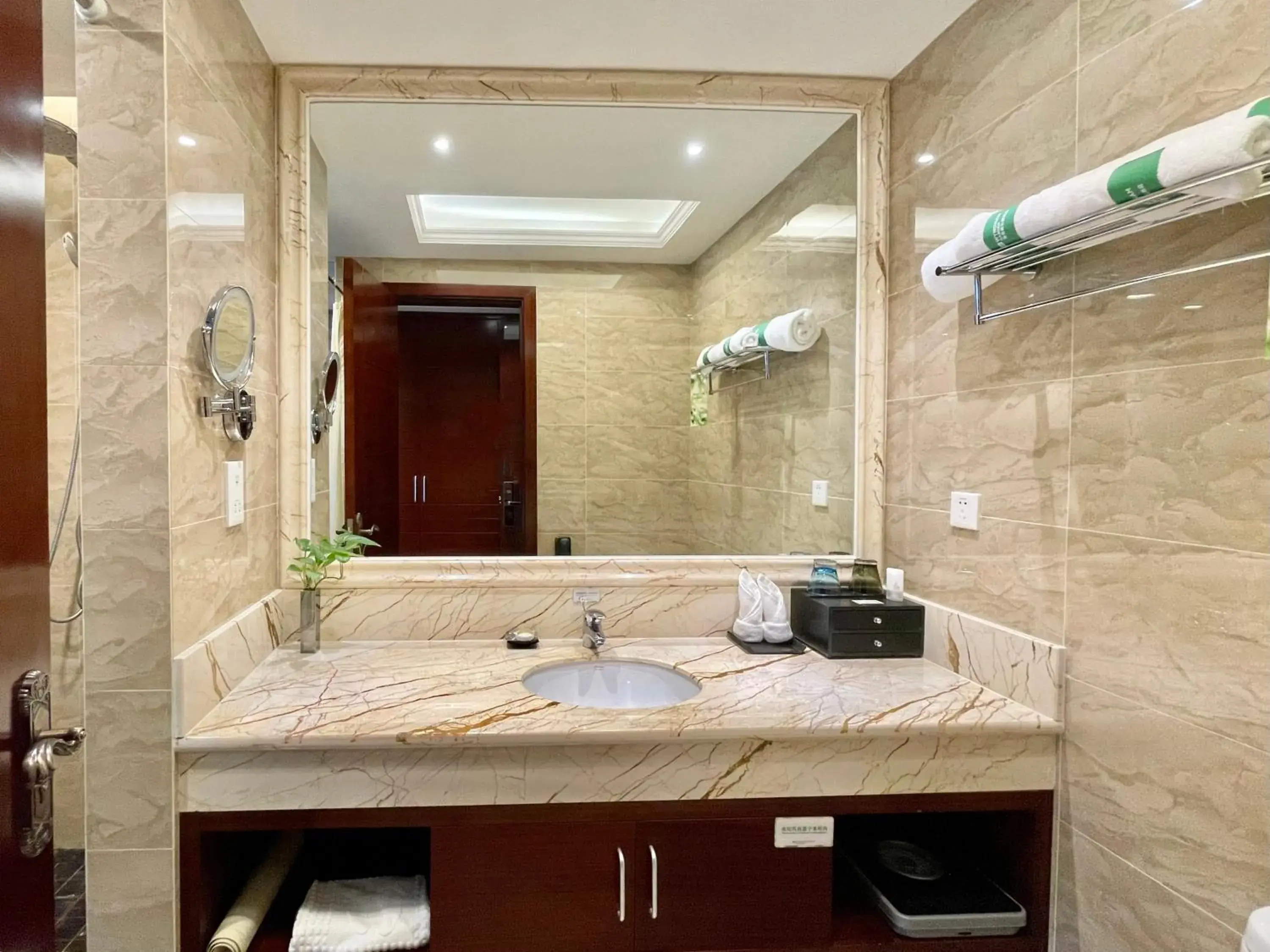 Bathroom in Wyndham Garden Haikou South