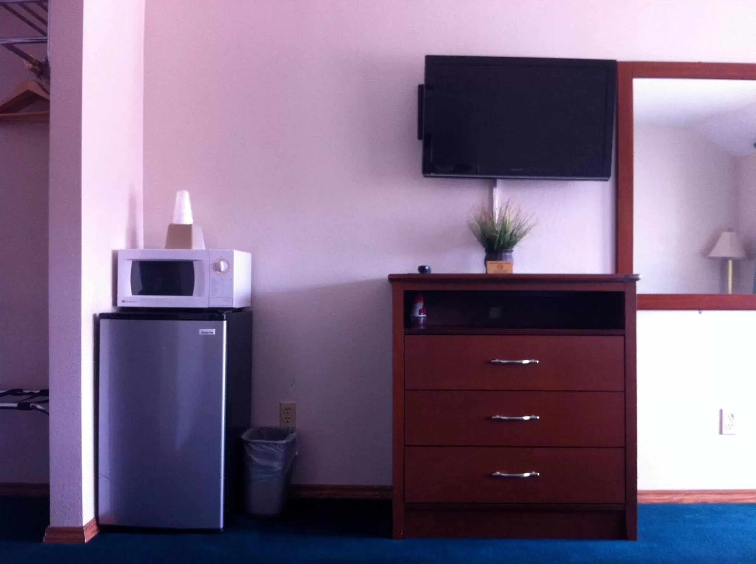 Decorative detail, TV/Entertainment Center in Legacy Inn