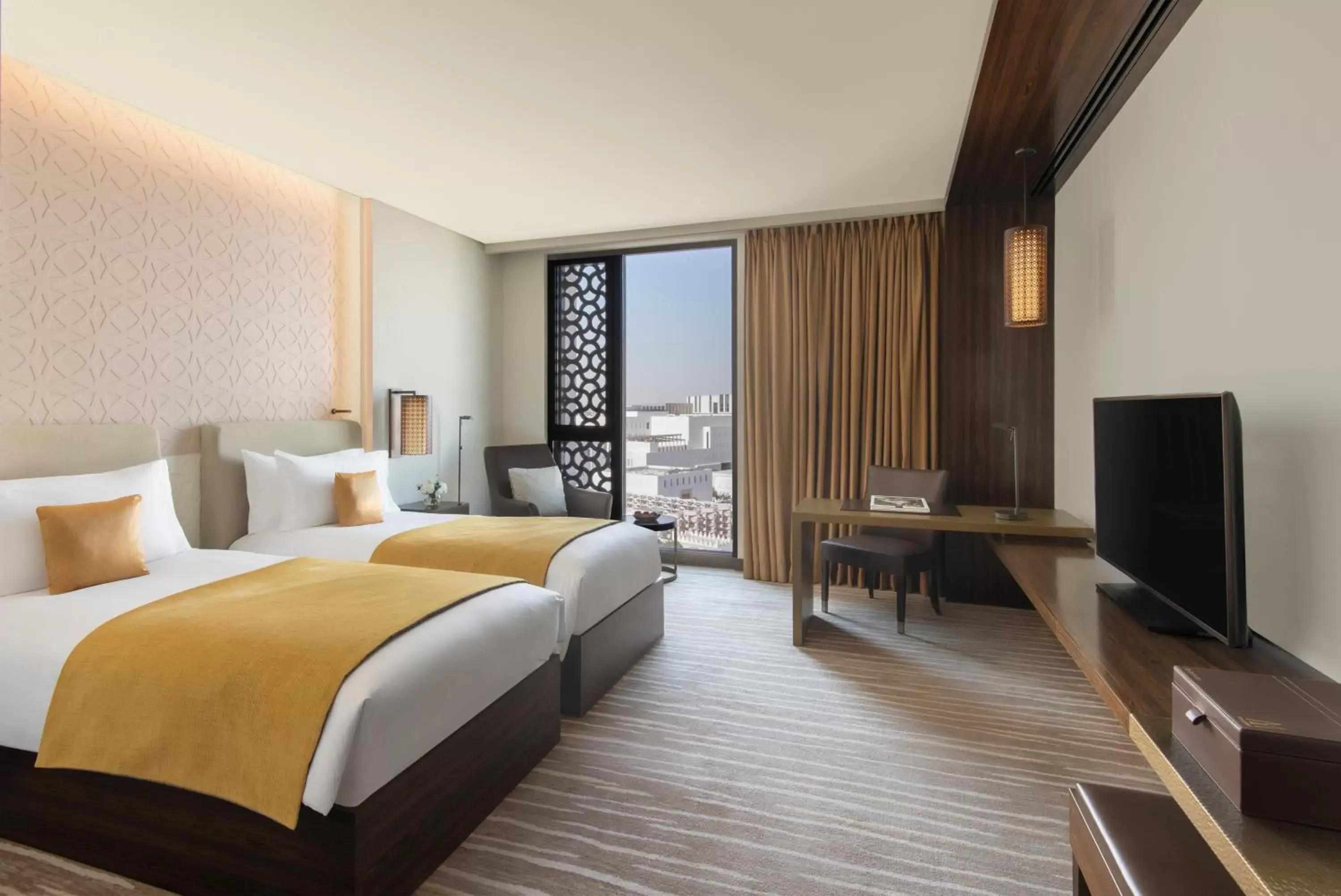 Bedroom, TV/Entertainment Center in Alwadi Hotel Doha - MGallery