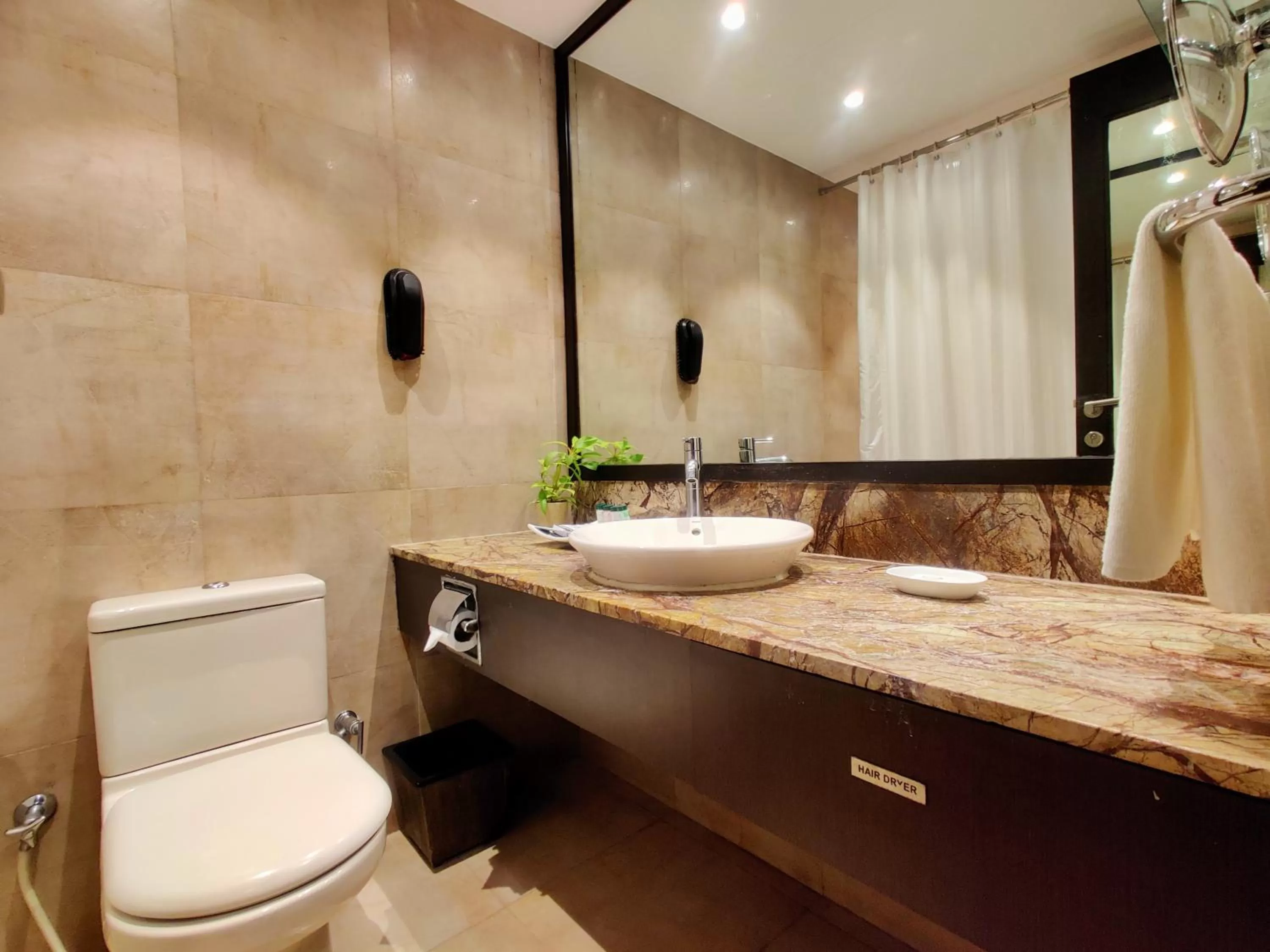 Bathroom in Fariyas Resort Lonavala