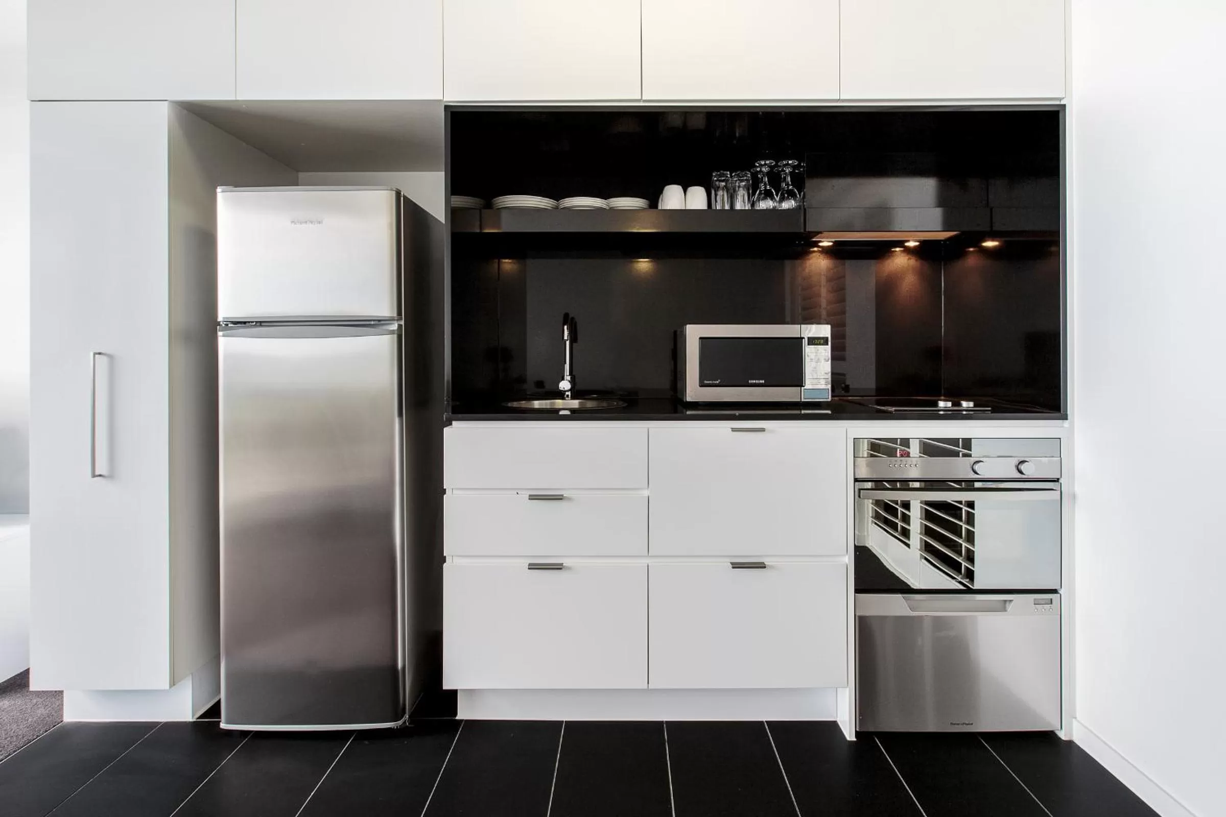 Kitchen or kitchenette in Code Apartments